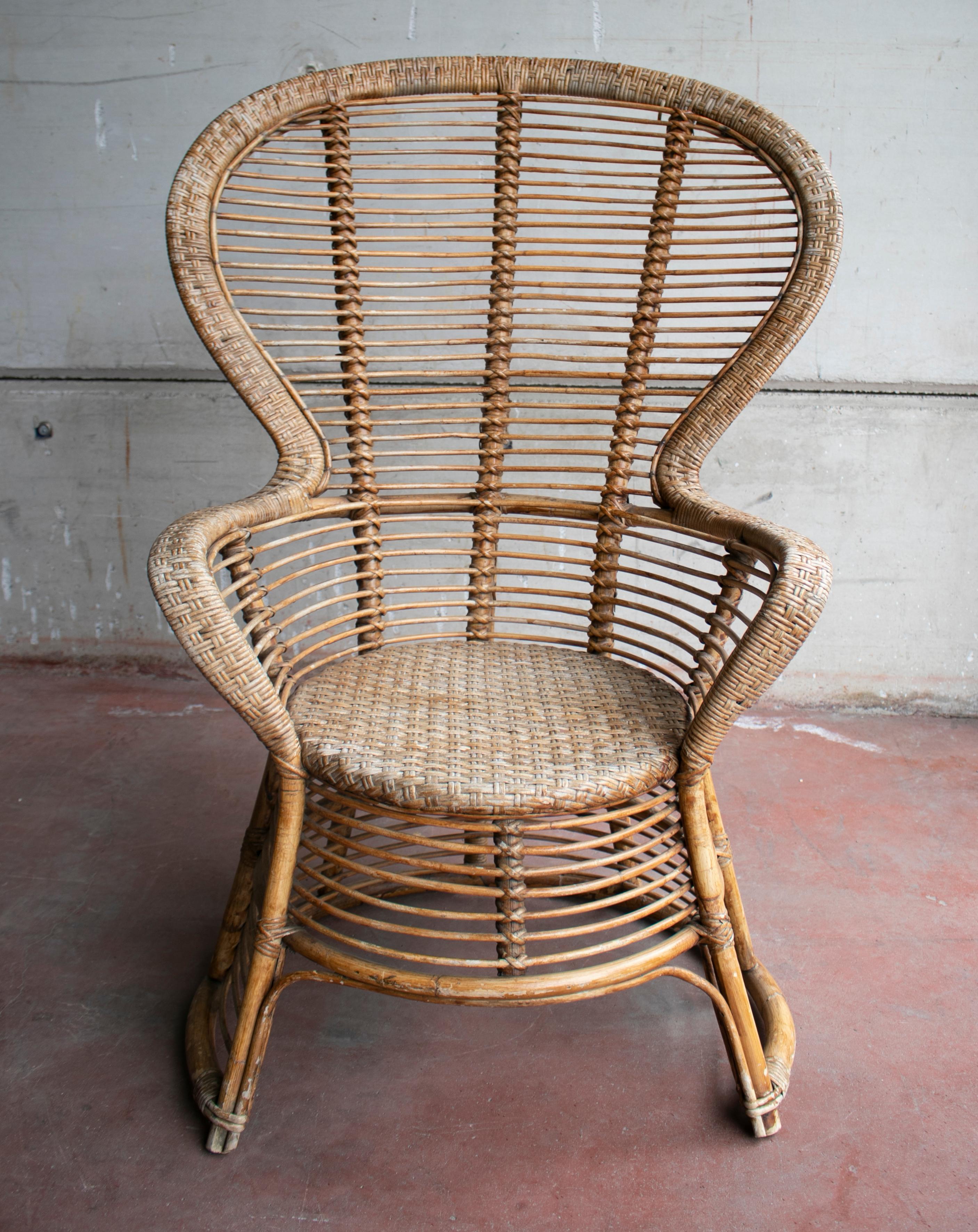 1970s Spanish armchair of bamboo wicker tall back rest.
