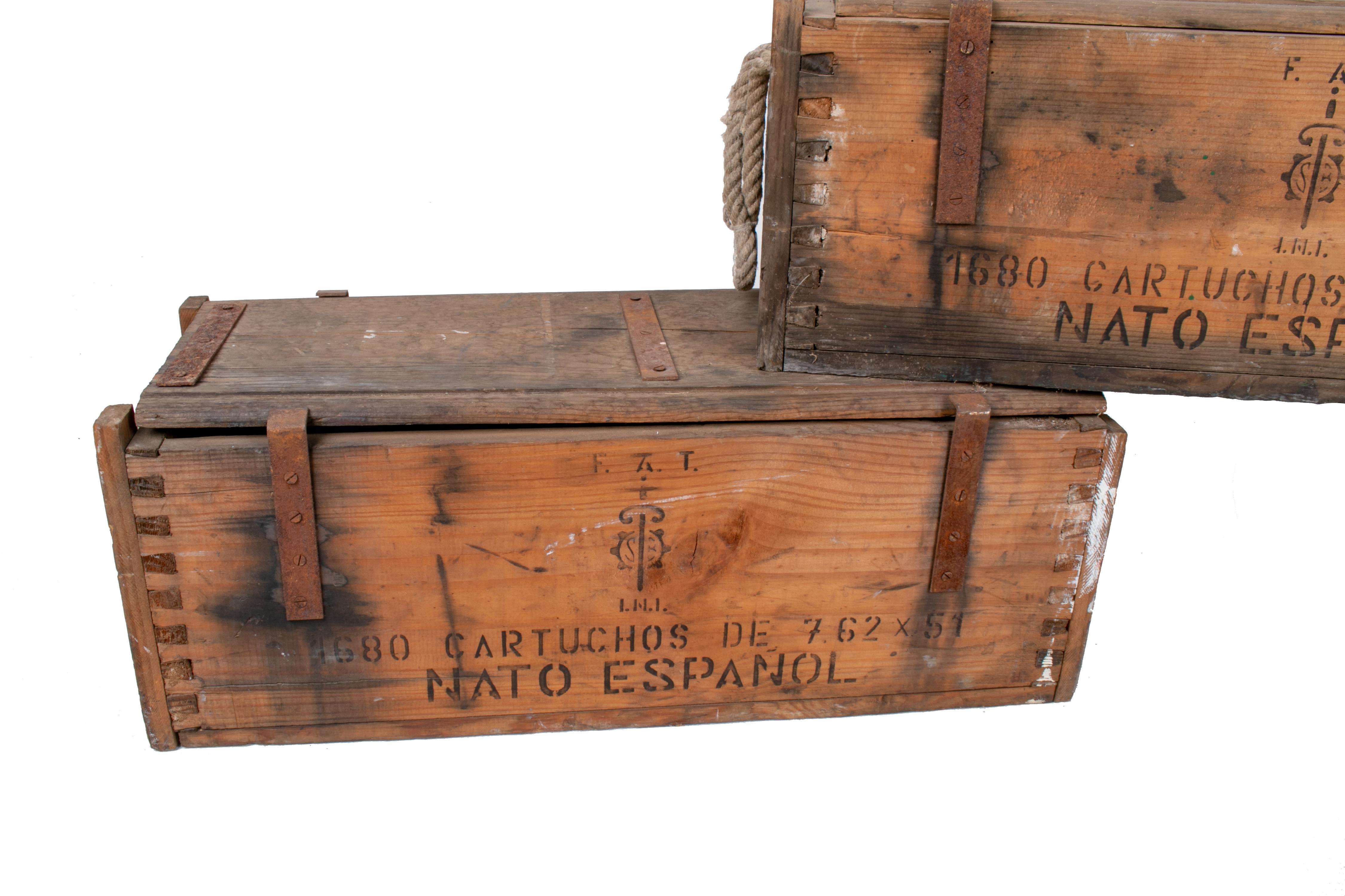 1970s Spanish army wooden ammunition boxes with iron fittings rope handles.

  