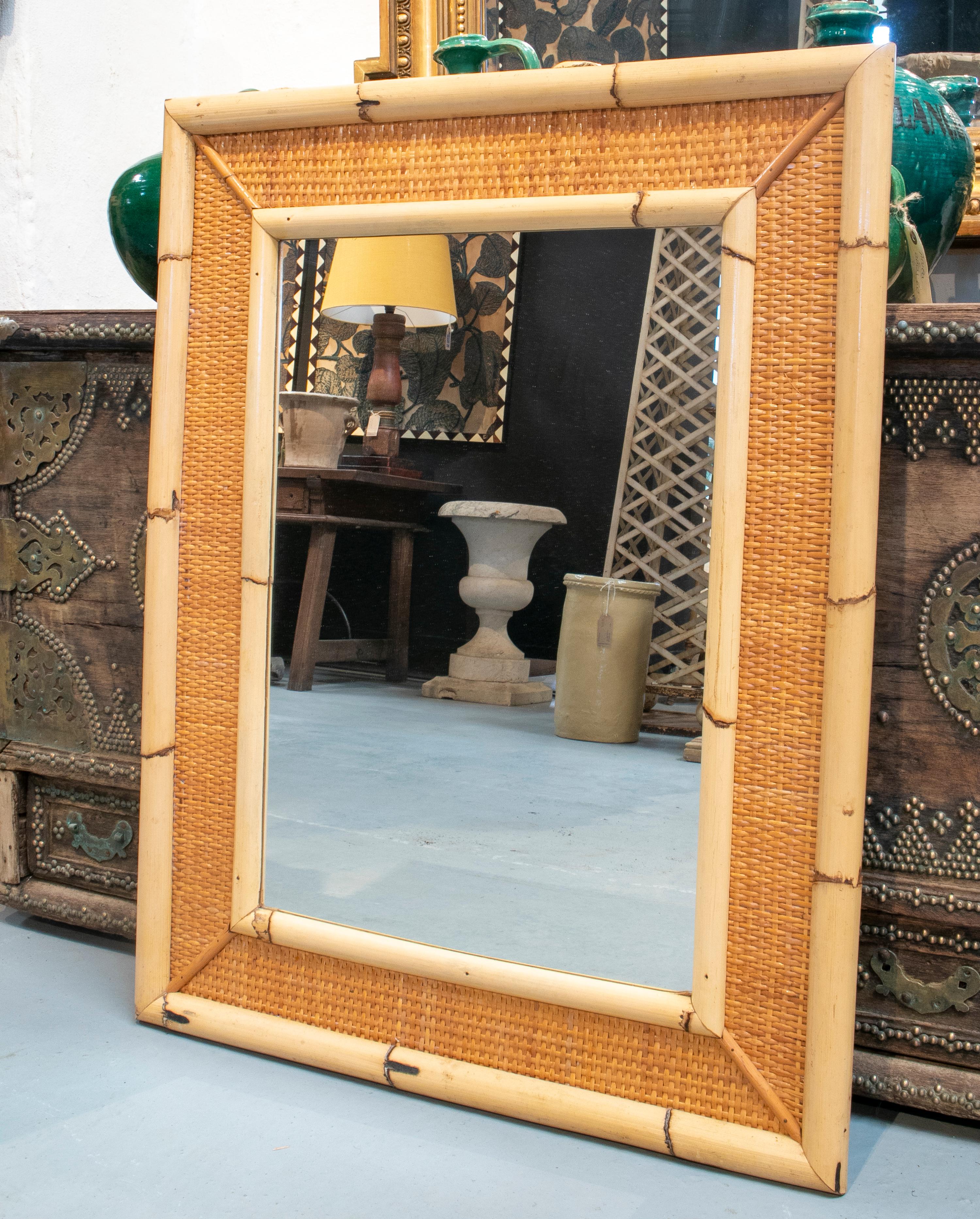 1970s Spanish bamboo and rattan framed mirror.