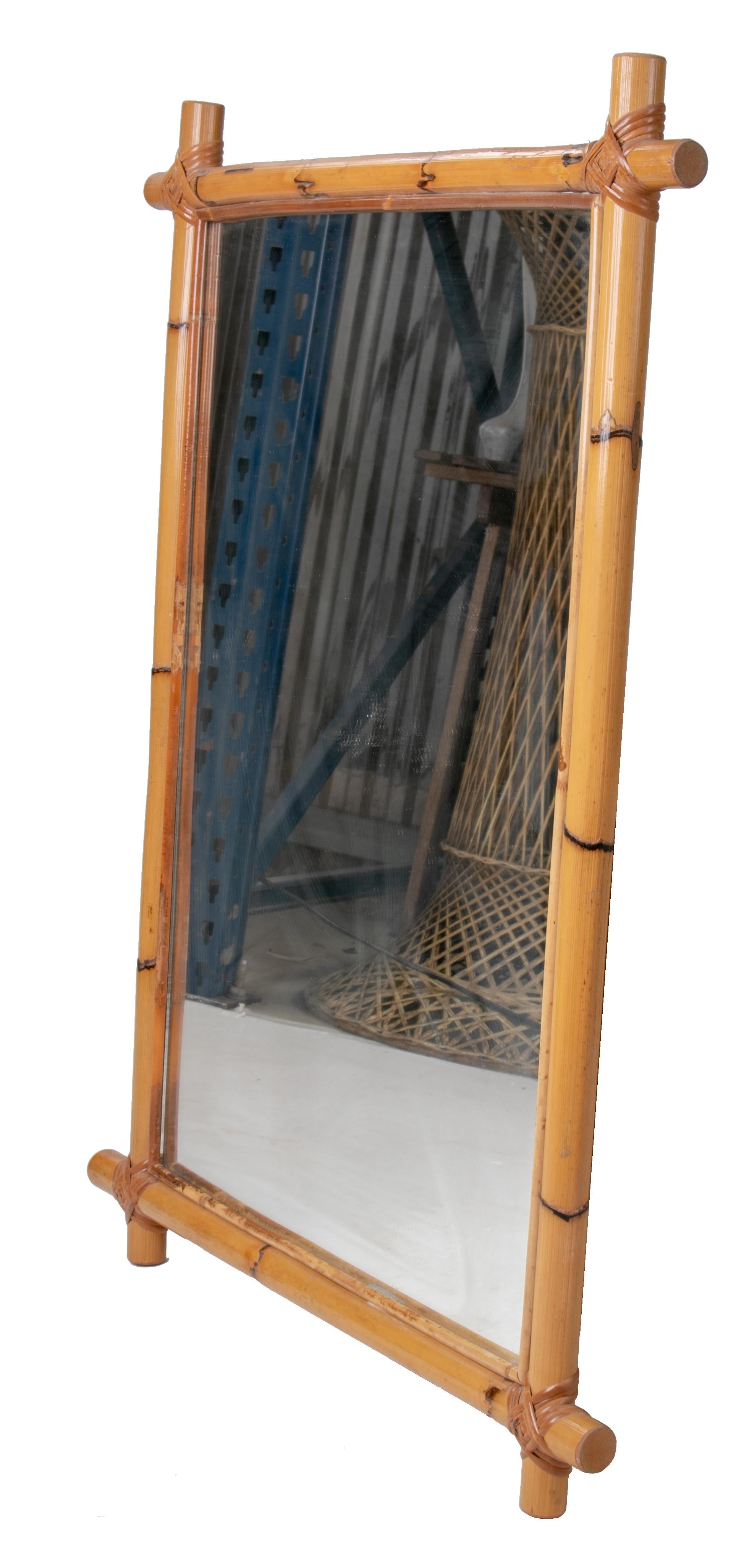 1970s Spanish bamboo and wicker framed mirror.