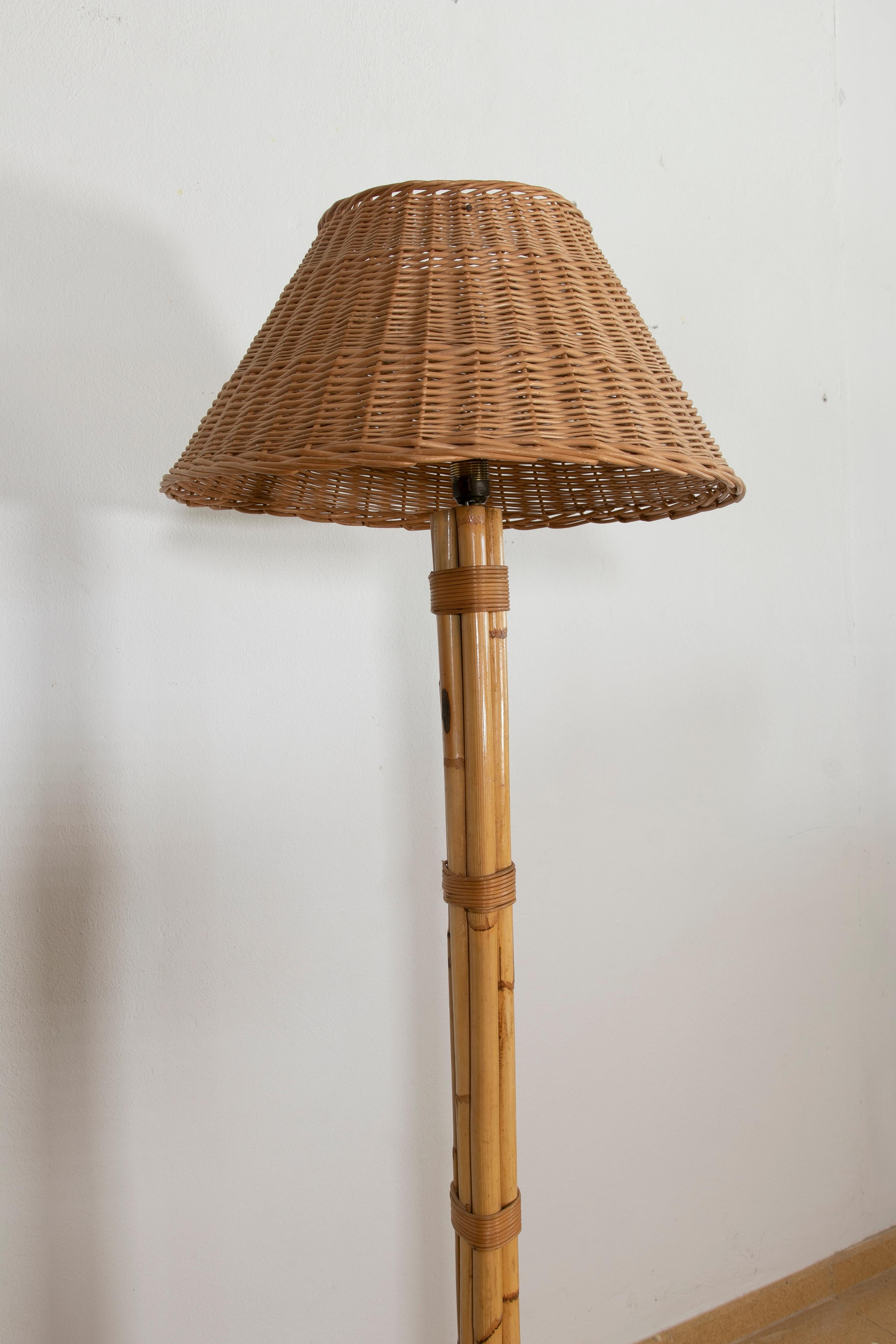 1970s, Spanish bamboo floor lamp with wicker lampshade.