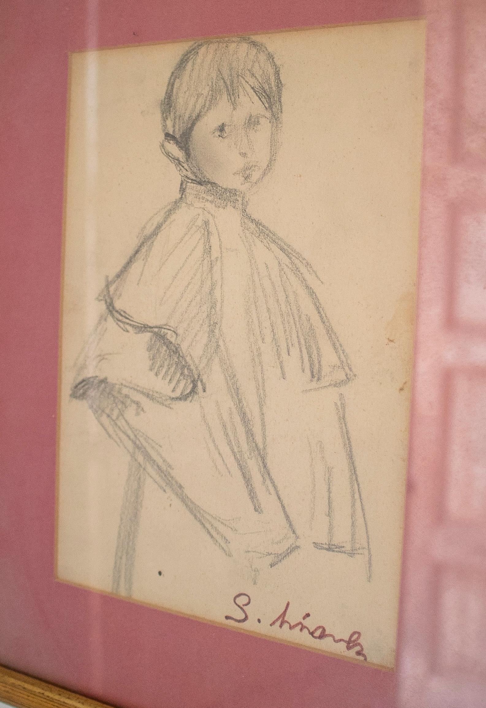 Vintage 1970s Spanish boy pencil drawn portrait framed and signed 

Mesures intérieures : 22 x 15 cm.
 