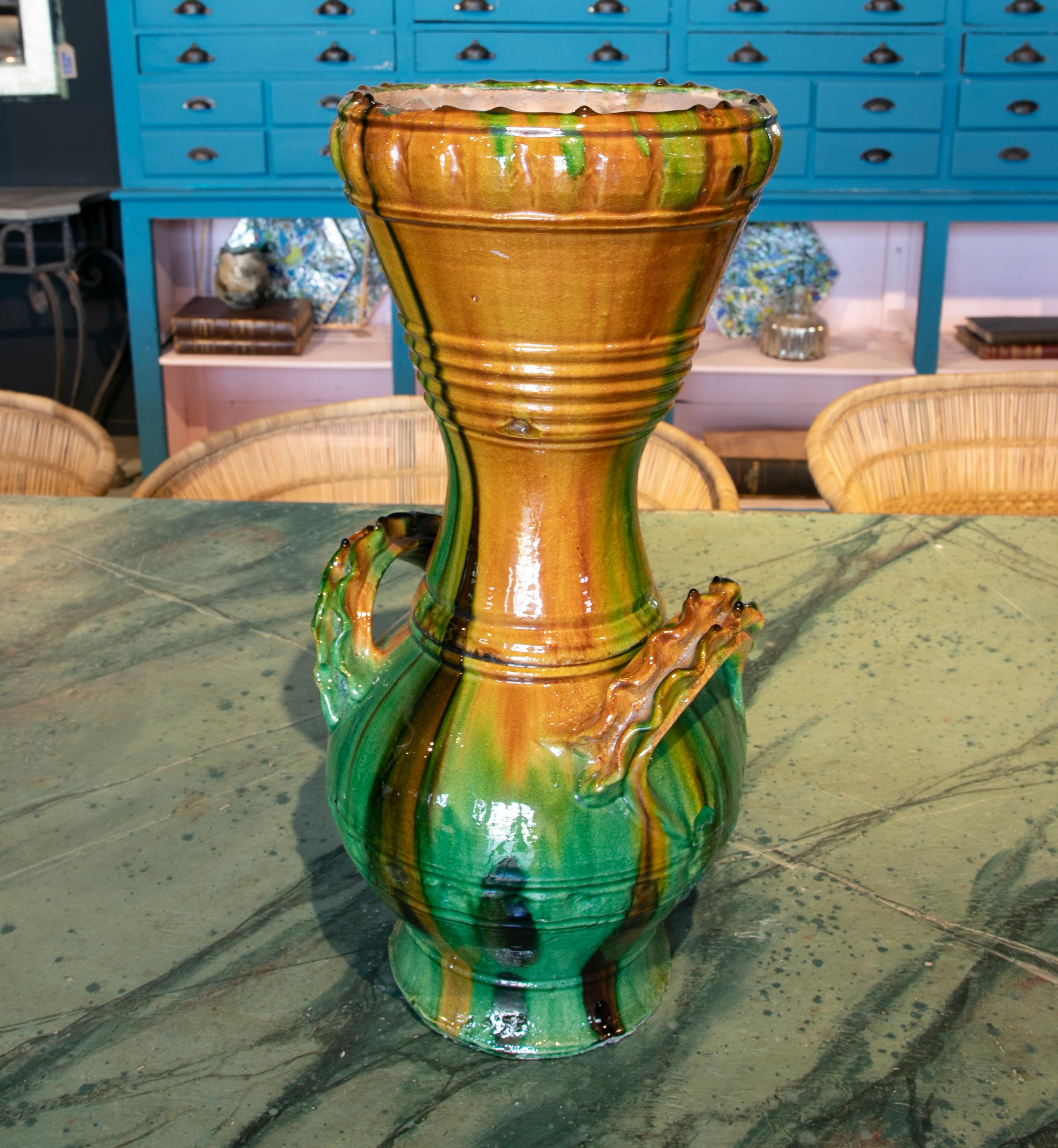 Rustic 1970s Spanish brown and green glazed terracotta ceramic vase with handles.