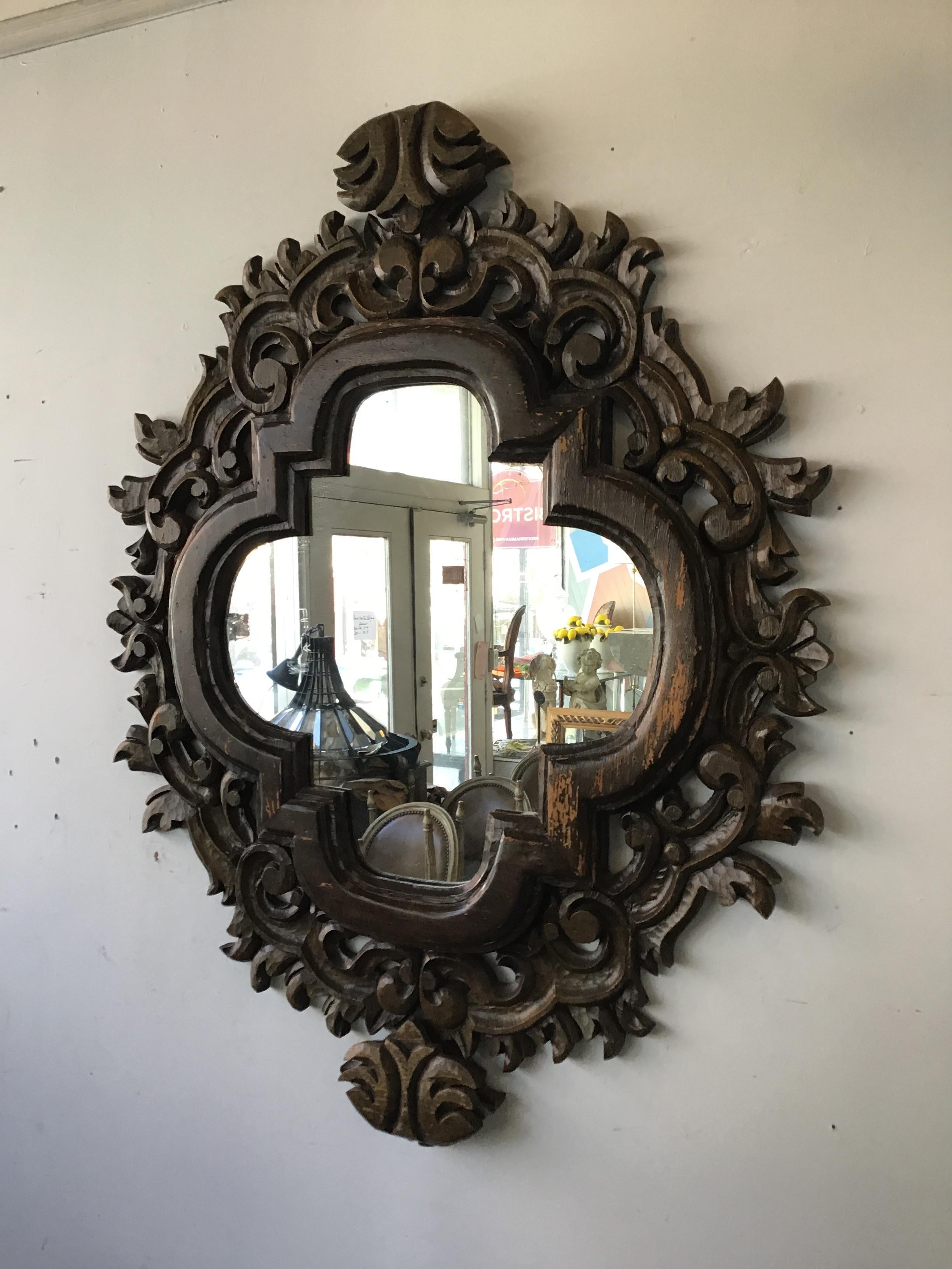 1970s Spanish carved wood mirror.