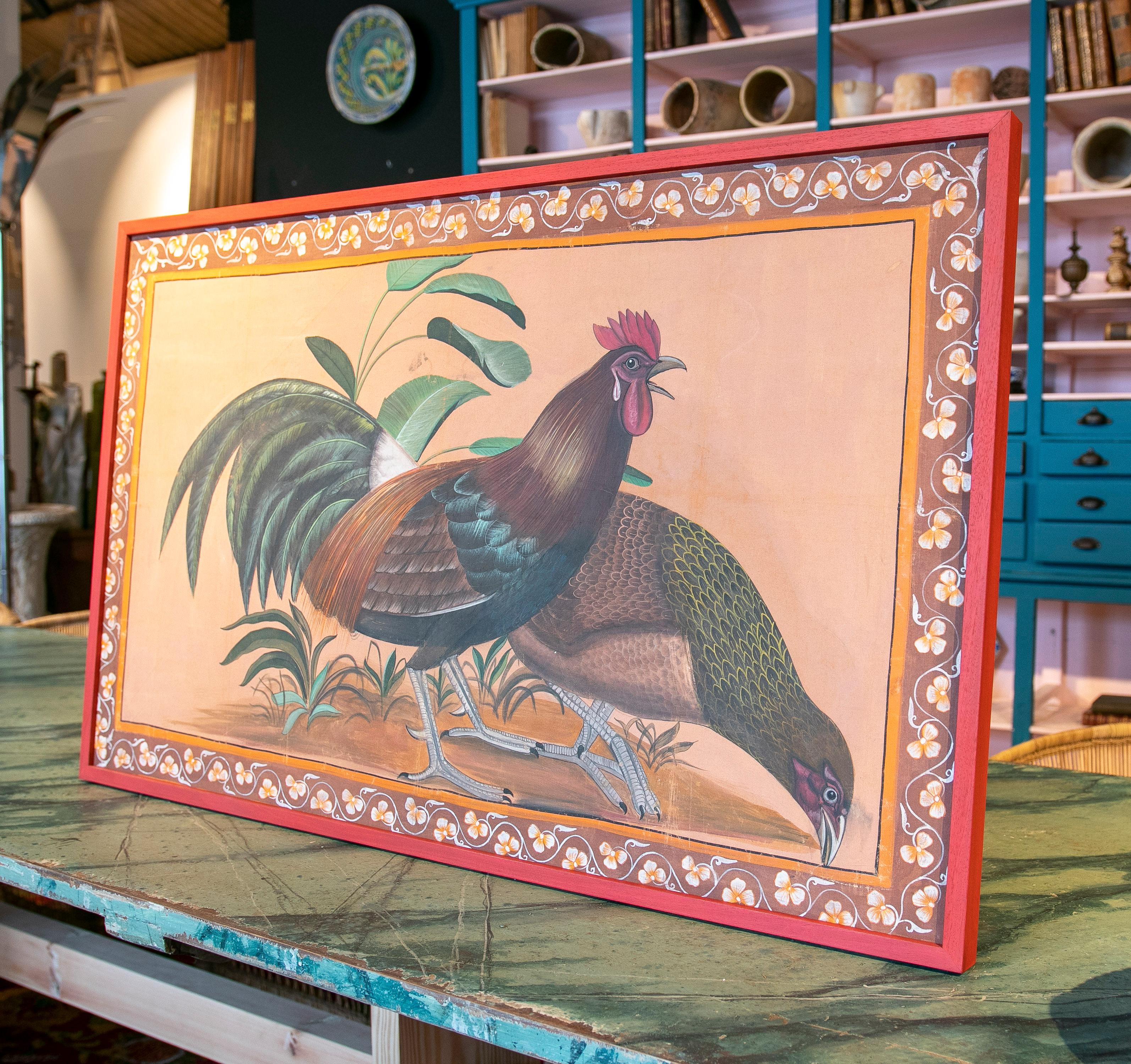 1970s Spanish cock and hen hand drawn painting on canvas with red frame.
 