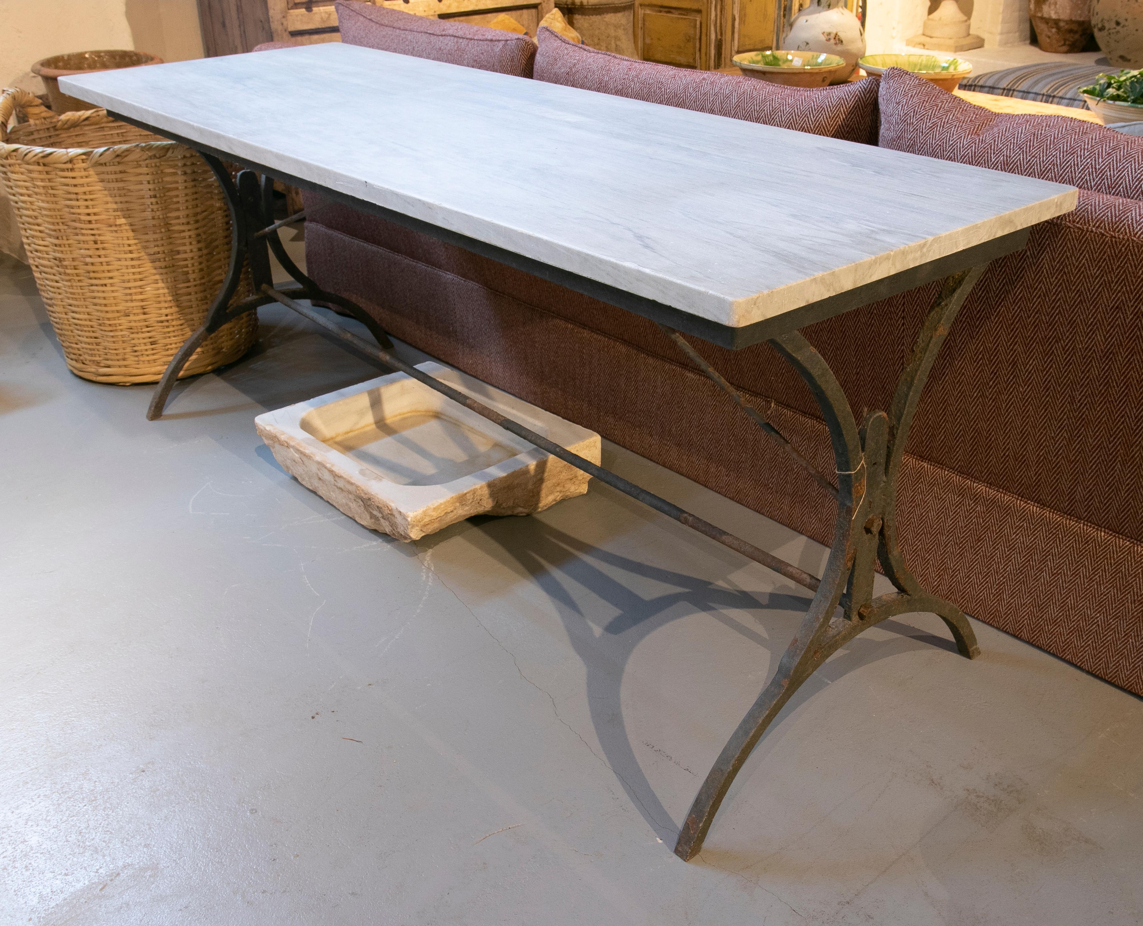 1970s Spanish console table with an Iron base and marble top.