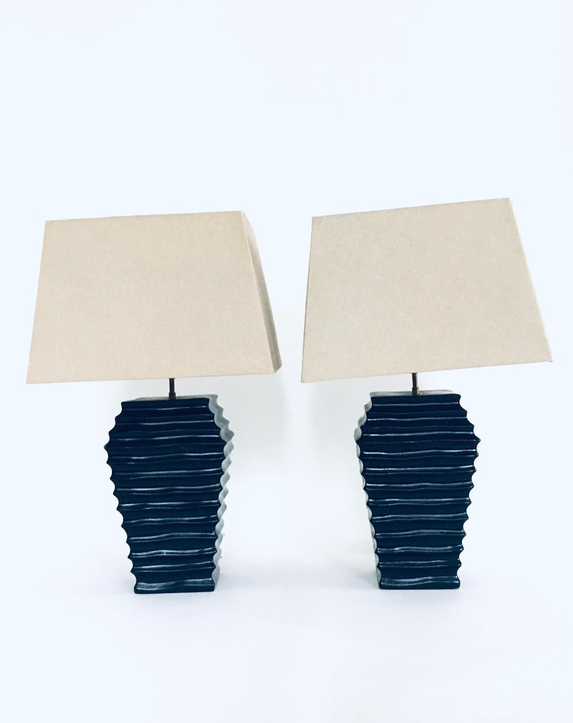 Vintage Design Ceramic Table Lamp set. Made in Spain, 1970's period. Black painted white clay molded lamp base with brass trims and newer shades. These come in very good condition, with minor wear to the base and shades. Each lamp measures: 45cm x