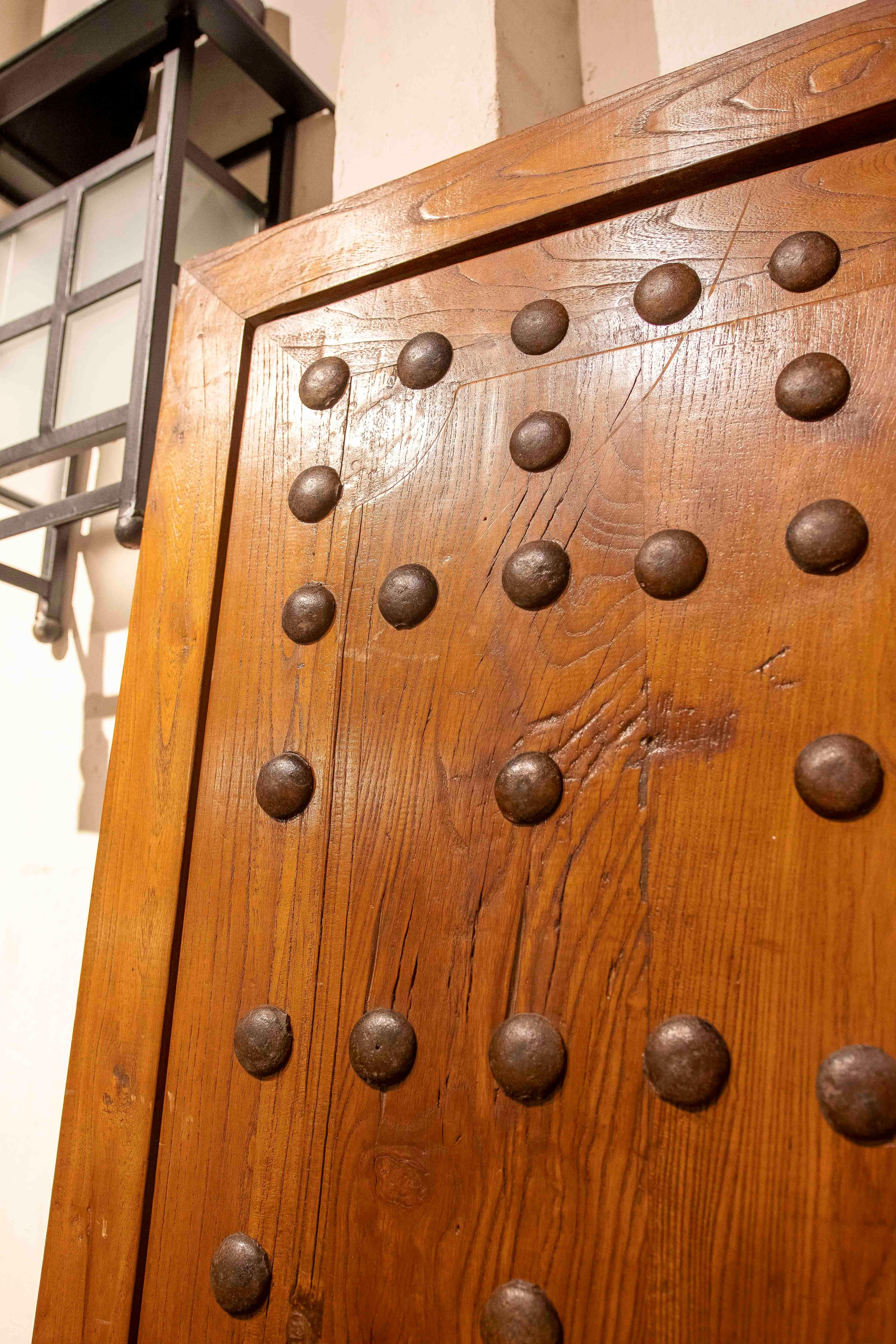 20th Century 1970s Spanish Elm Wood Doors with Castilian-style Wrought Iron Studs For Sale