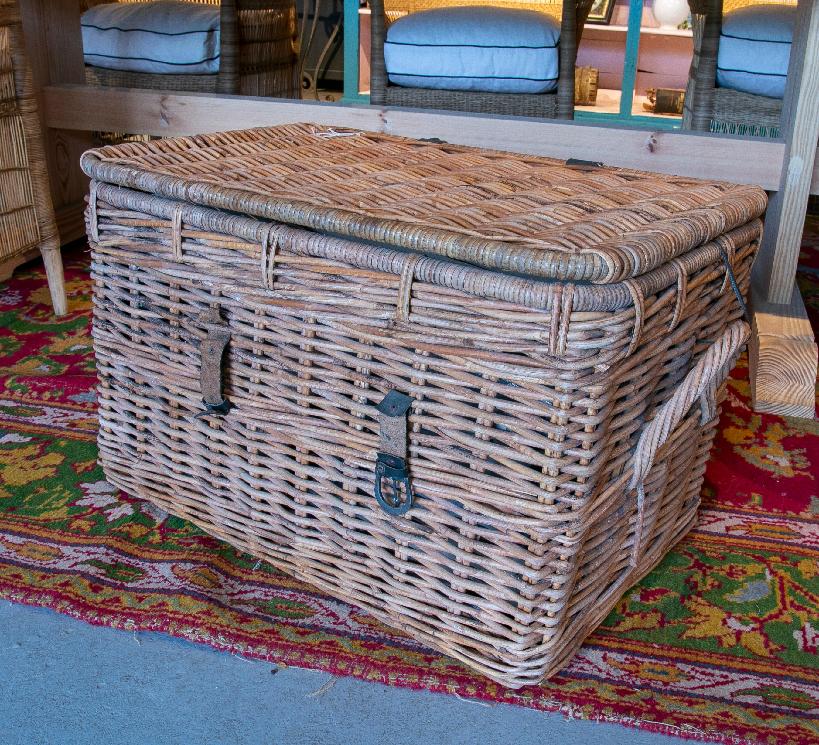 wicker trunk with leather straps