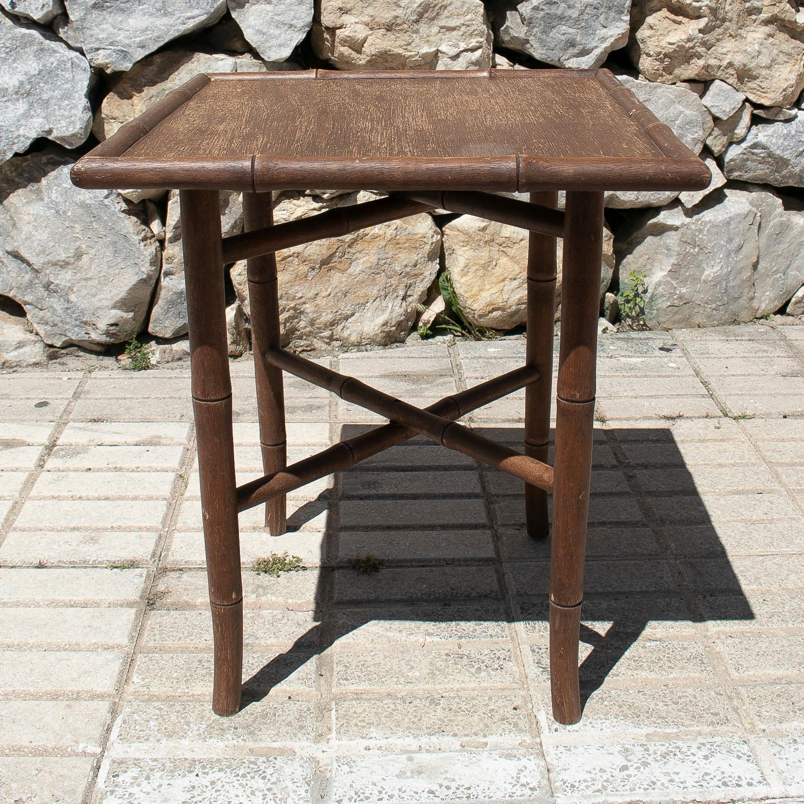 Vintage 1970s Spanish faux bamboo wooden side table.