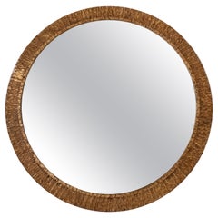 Miroir mural rond espagnol à cadre en fer doré des années 1970