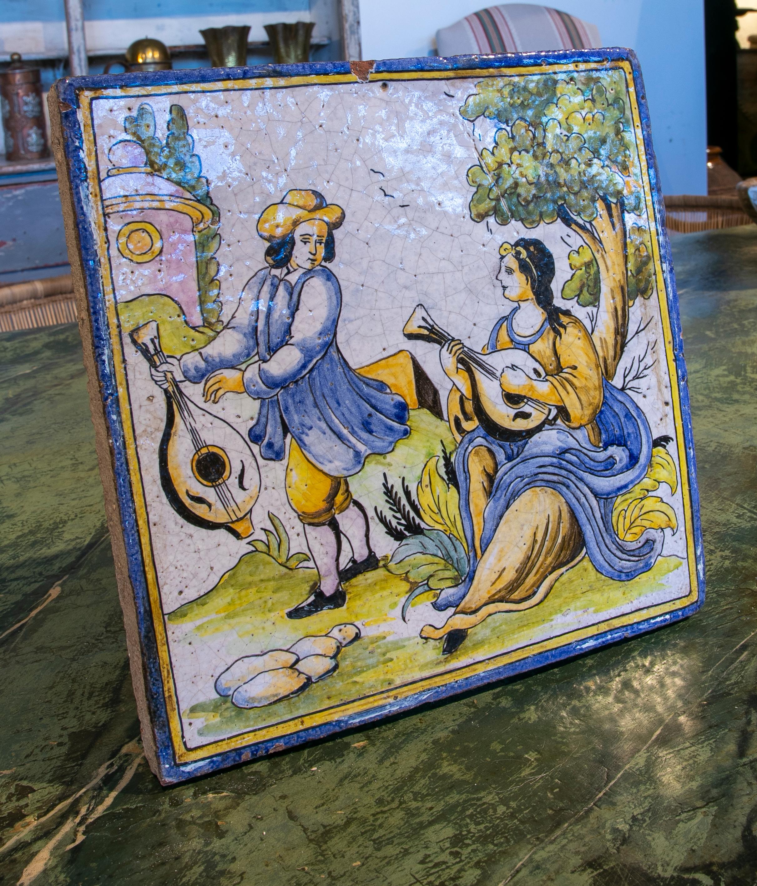 1970s Spanish Hand Painted Glazed ceramic tile with People Scene.