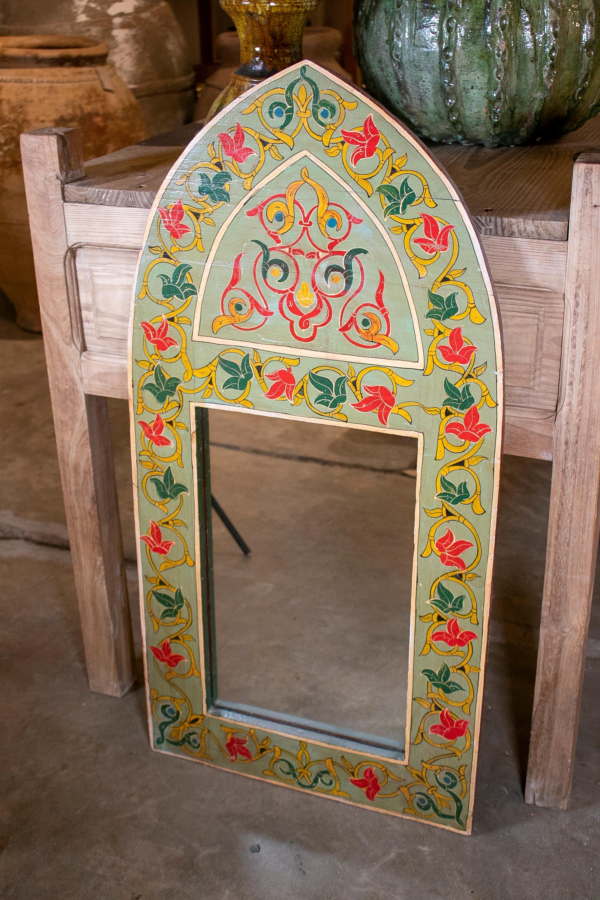 1970s Spanish hand painted wooden arched wall mirror.