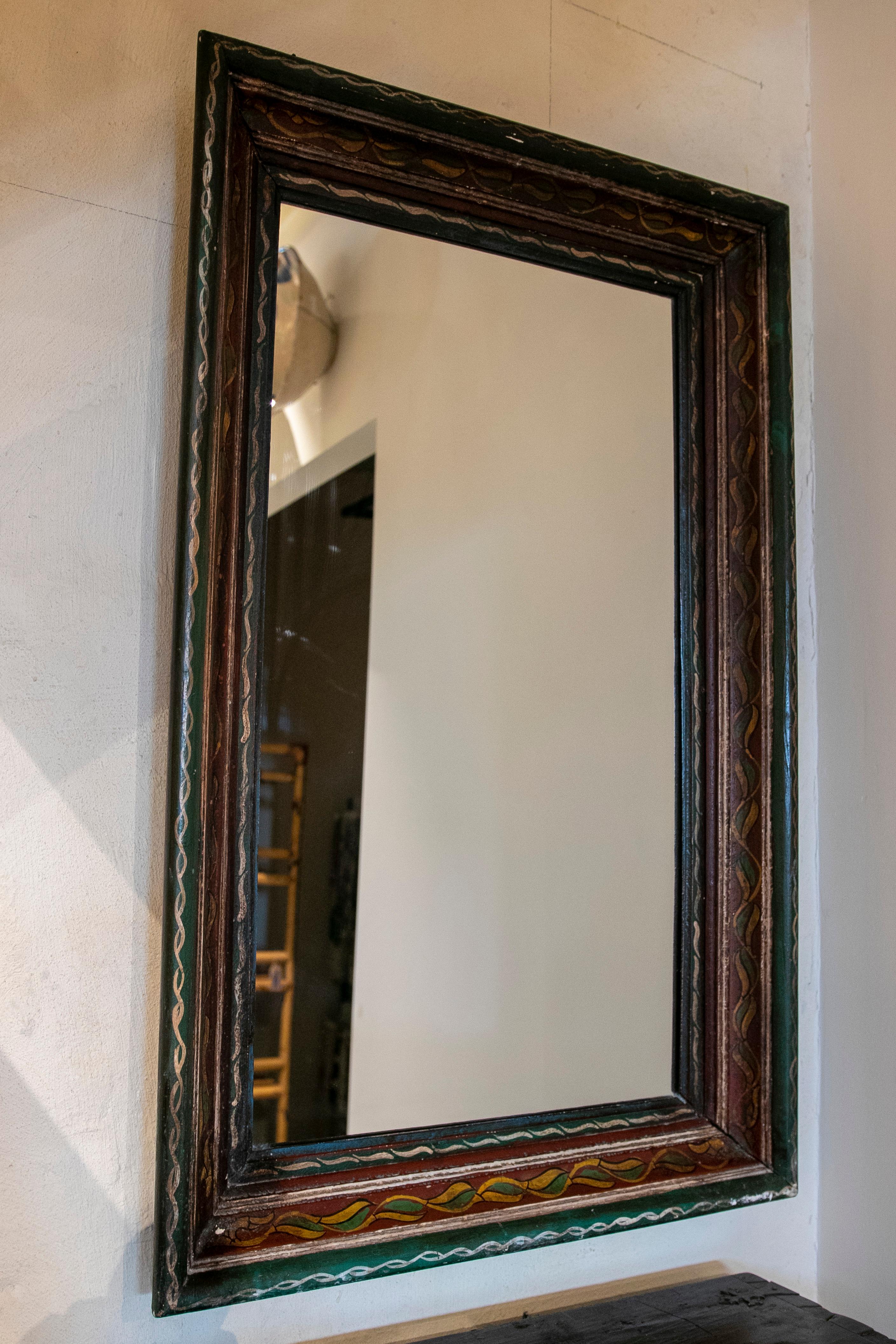 1970s Spanish Hand Painted wooden wall mirror.