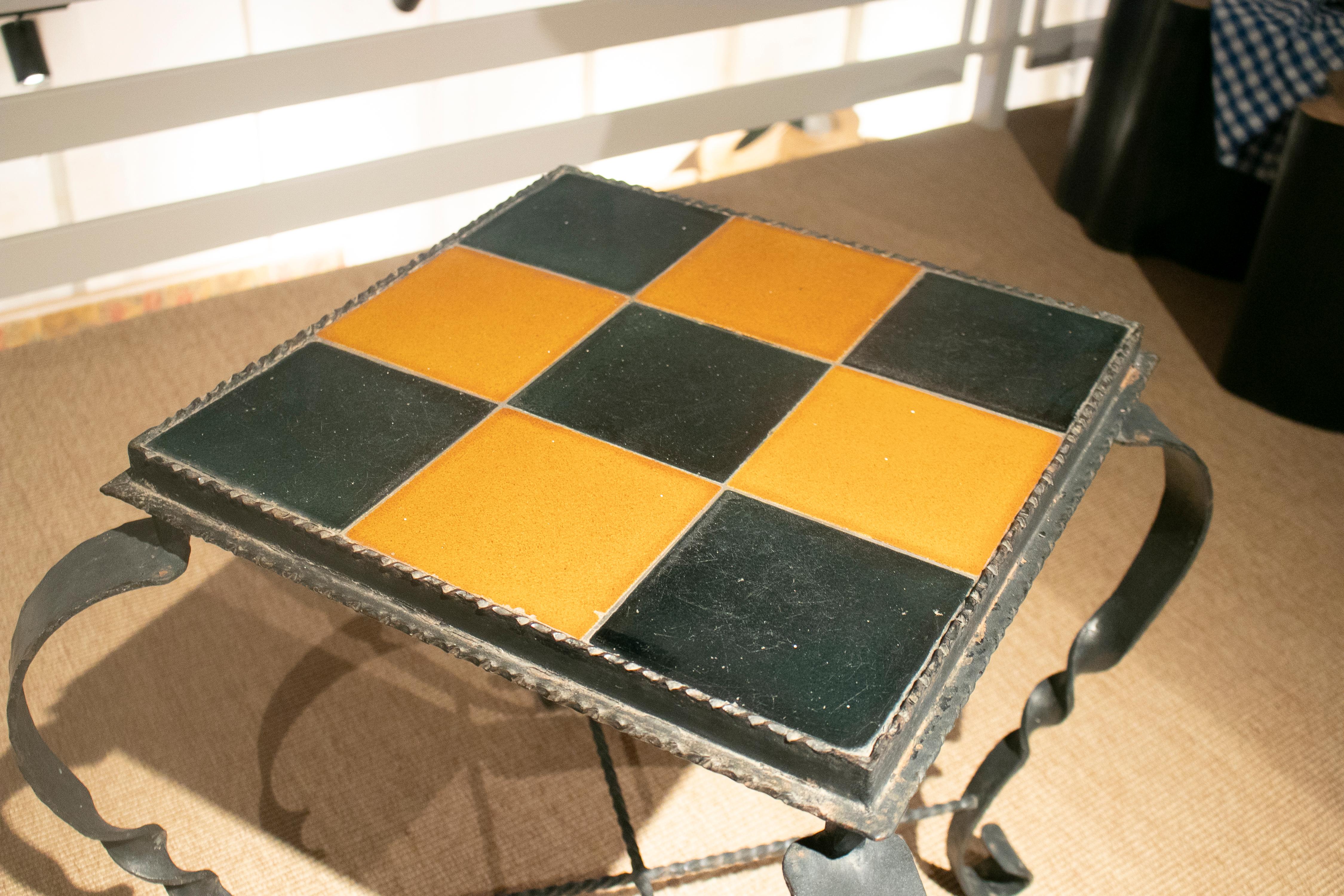 1970s Spanish Iron Garden Table w/ Checkered Glazed Ceramic Tiles Top For Sale 2