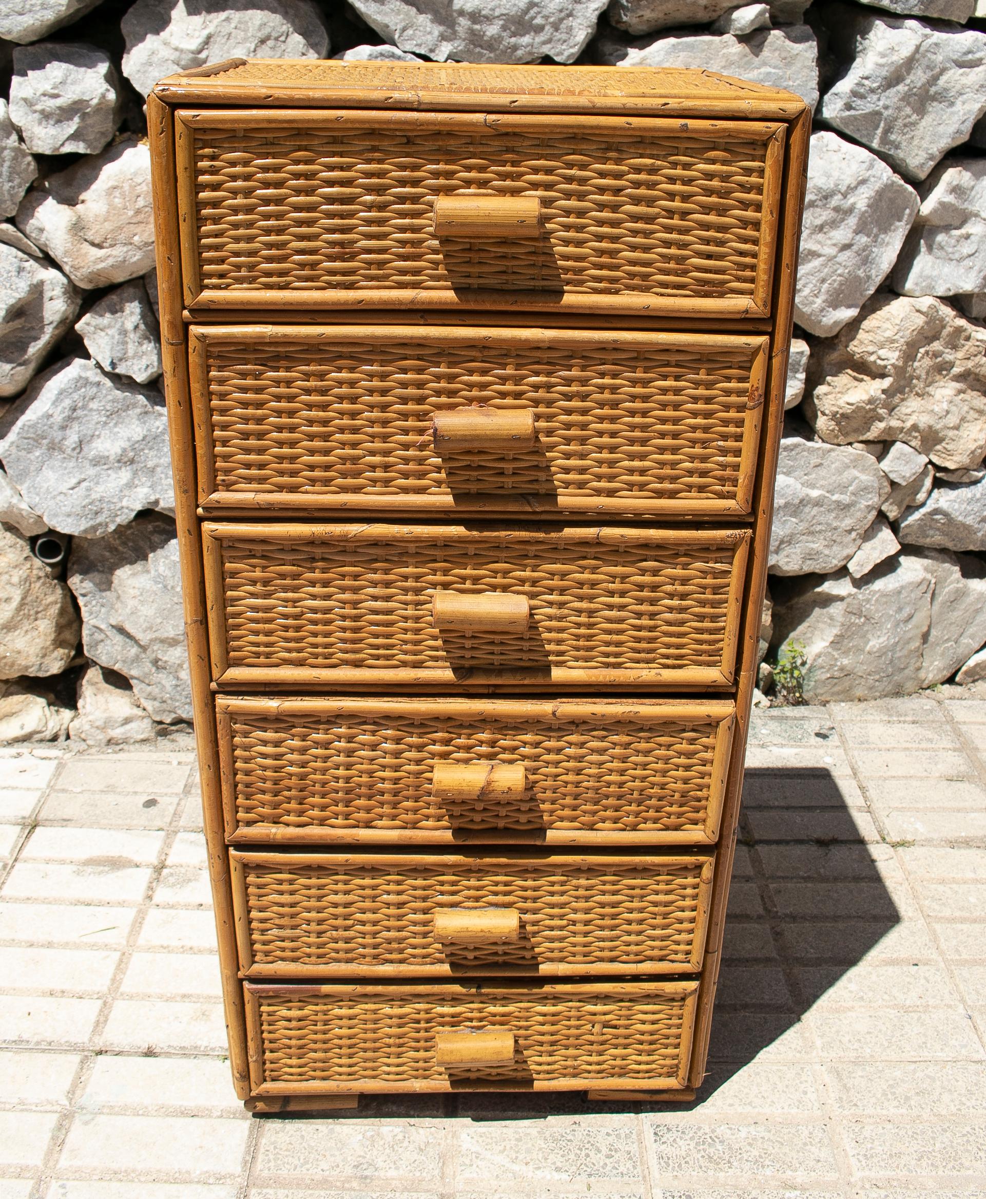 Vintage 1970s Spanish lace wicker 6-drawer tall chest.