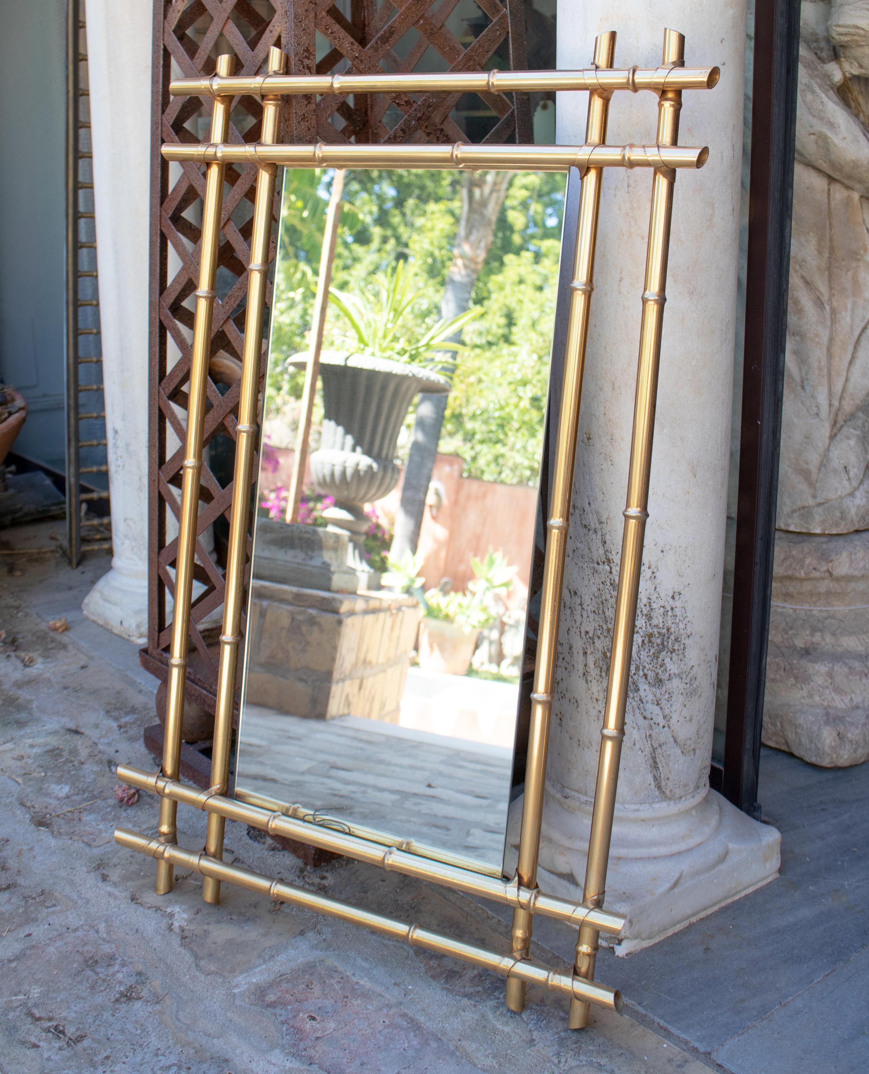 1970s Spanish metal mirror imitating bamboo and wicker.