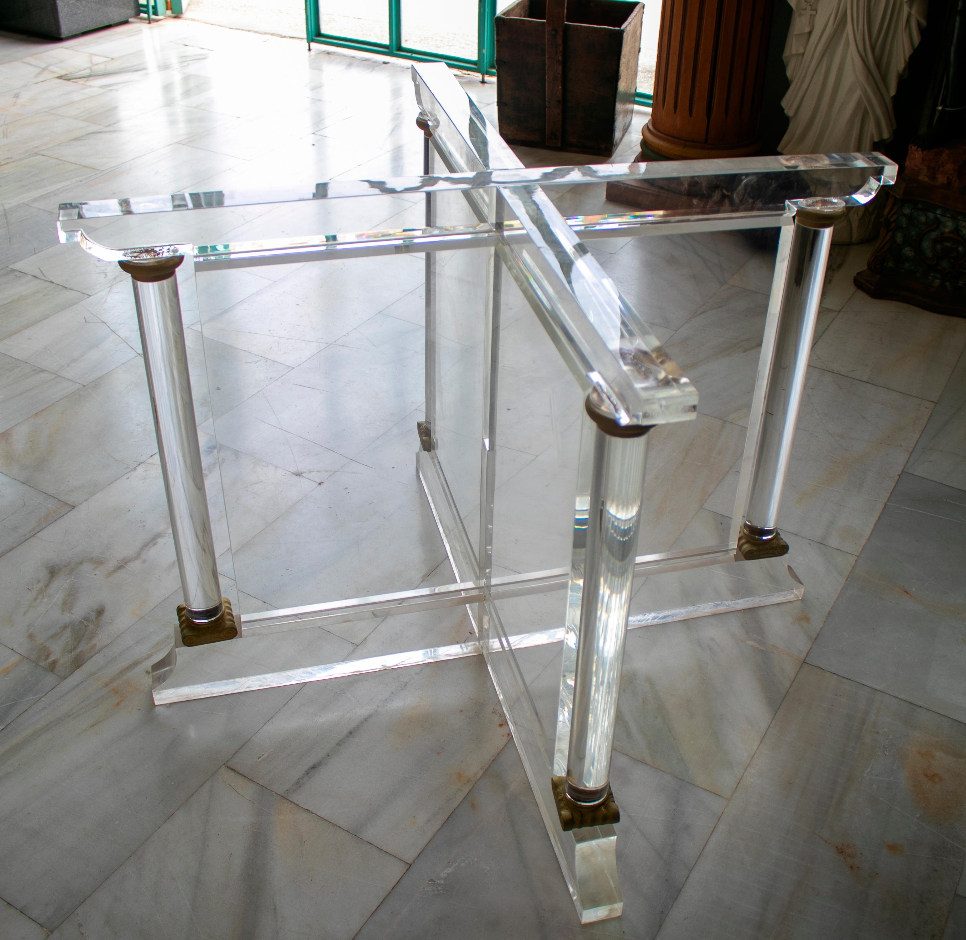 1970s Spanish methacrylate table base with bronze fittings.