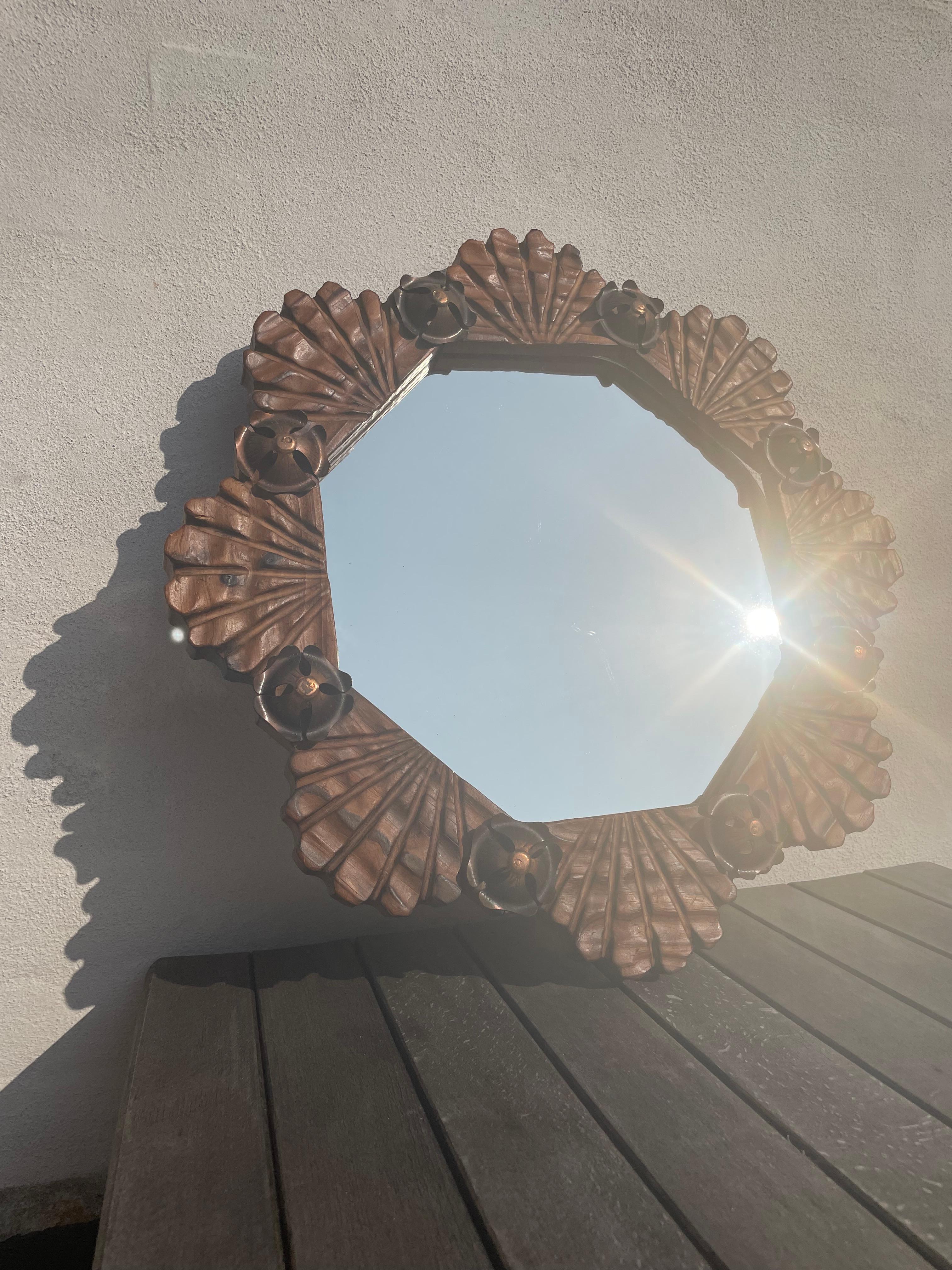 Hand-Crafted 1970s Spanish Modern Brutalist Wooden Wall Mirror with Brass Flowers For Sale