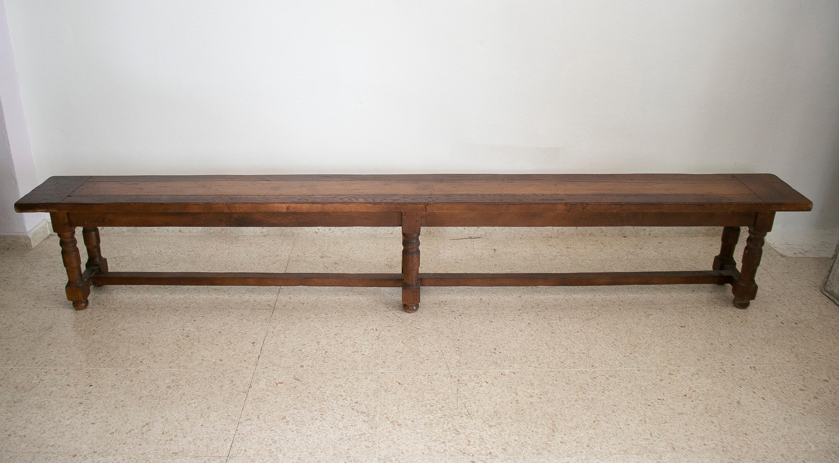 Rustic 1970s Spanish oak long bench with beam.