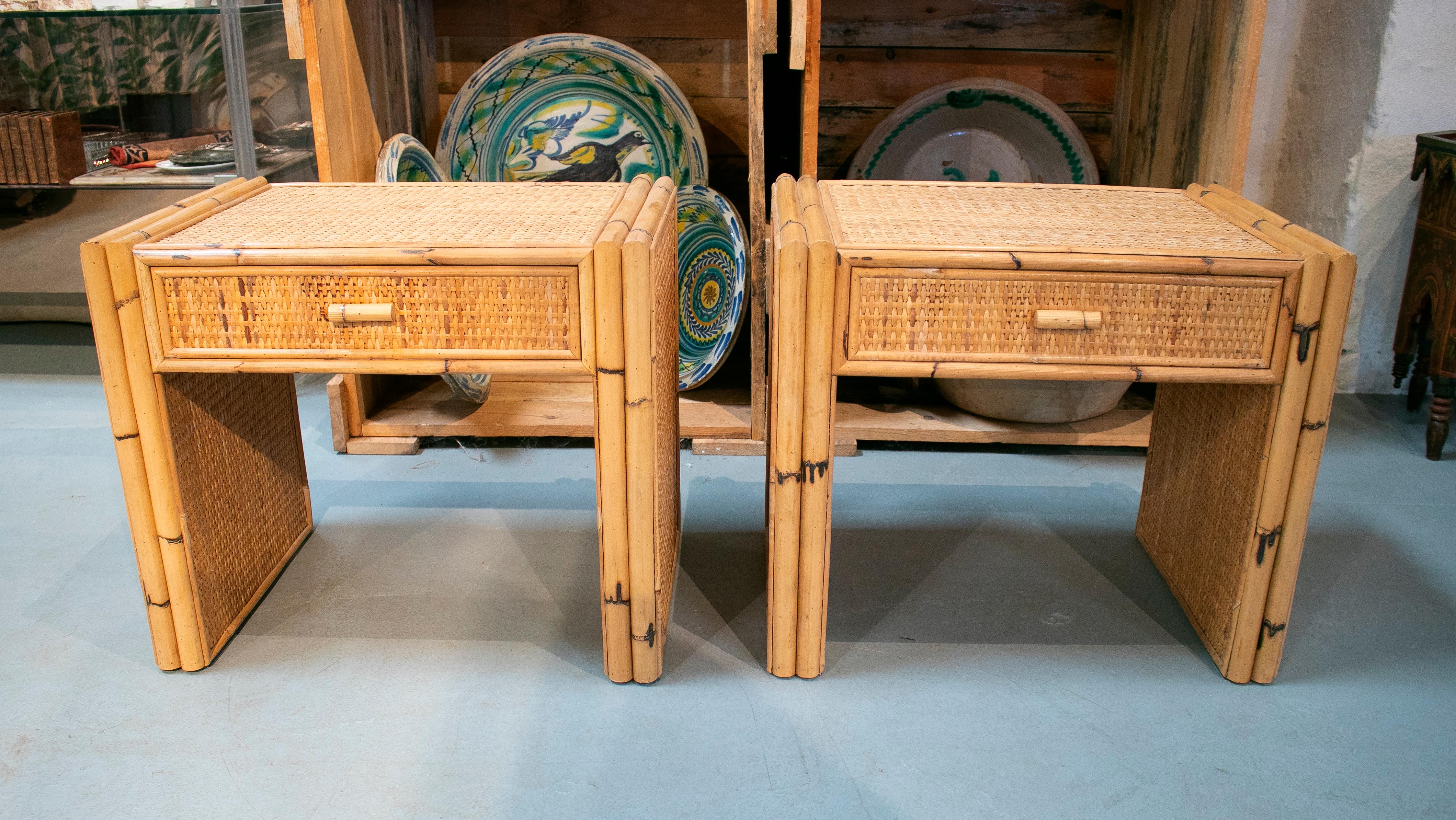 1970s Spanish pair of bamboo and rattan one drawer bedside tables.