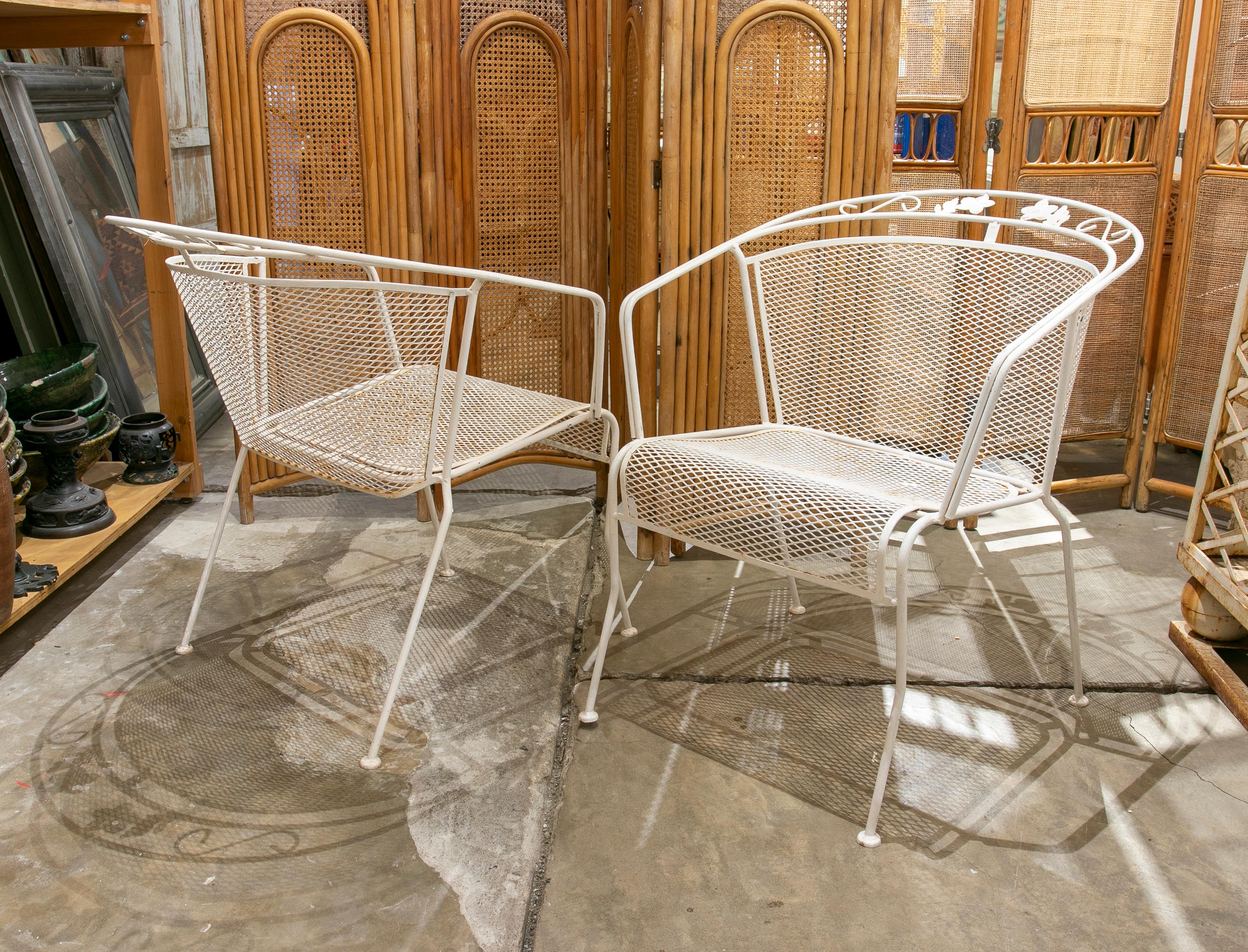 1970s Spanish pair of iron garden chairs in white color.