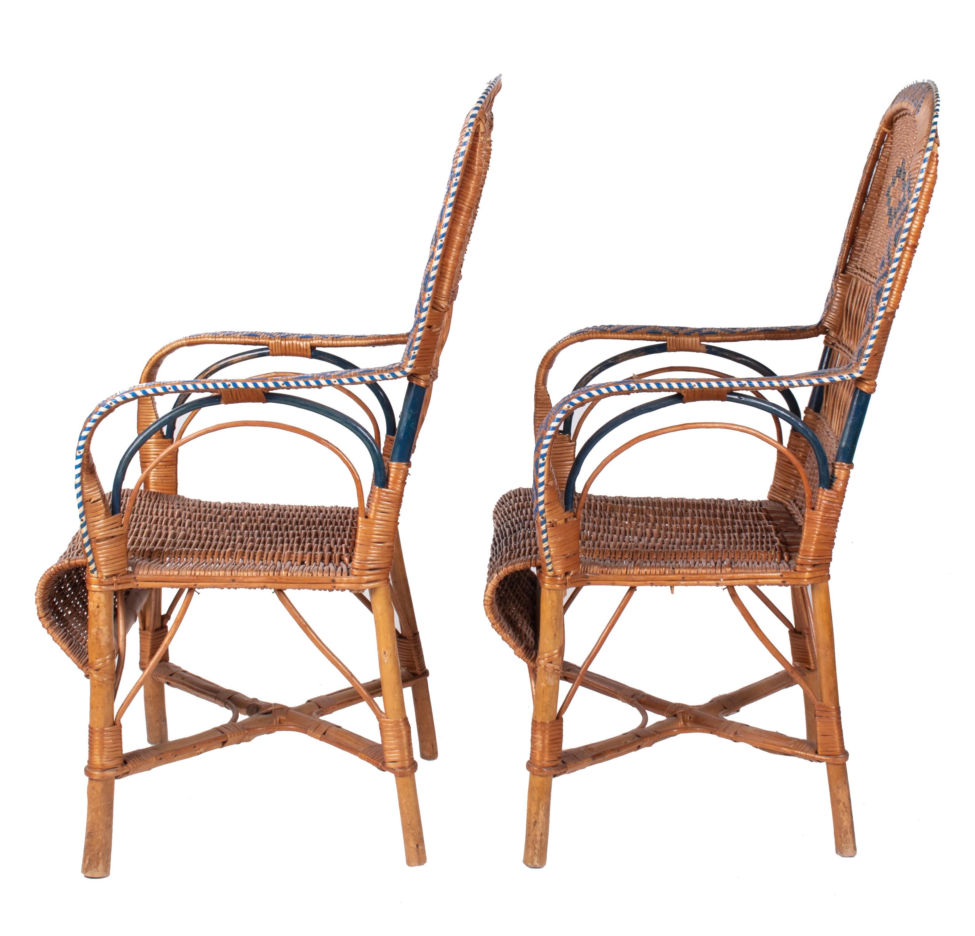 Late 20th Century 1970s Spanish Pair of Wicker and Wood Decorated Armchairs