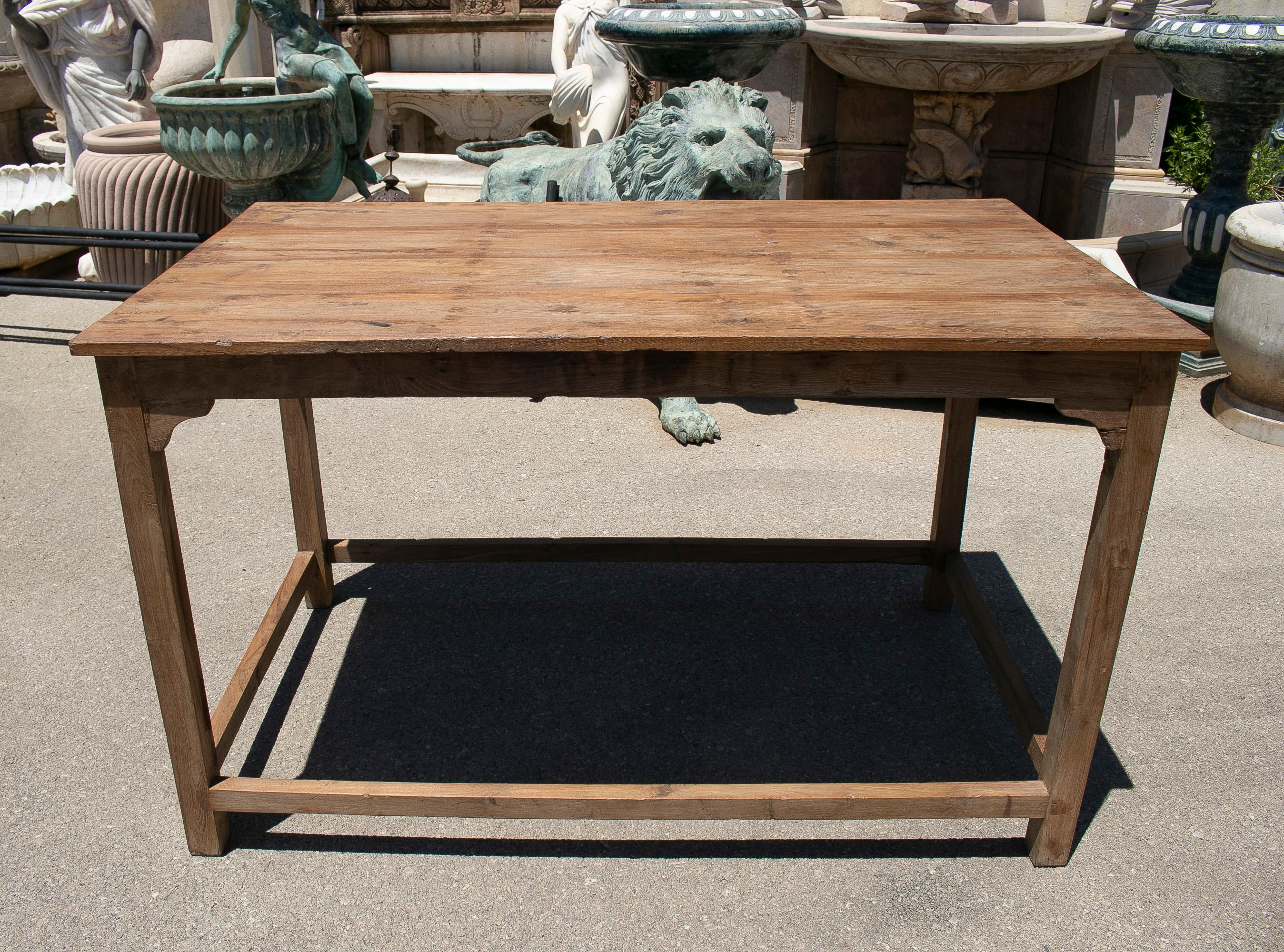 Rustic 1970s Spanish washed wood tailor's working table with crossbeam legs.