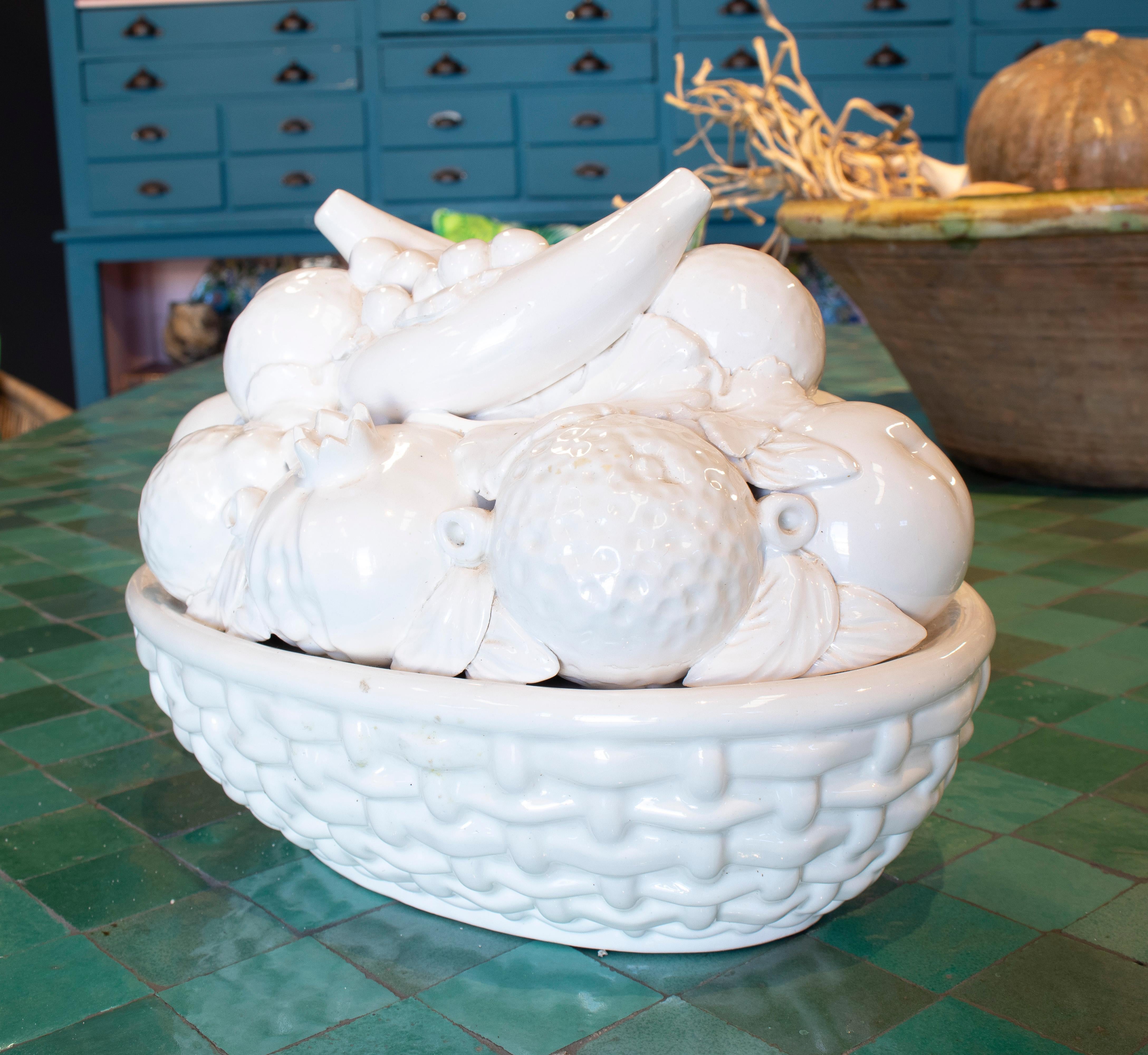 Vintage 1970s Spanish white glazed Manises pottery fruit basket sculpture figure centerpiece.