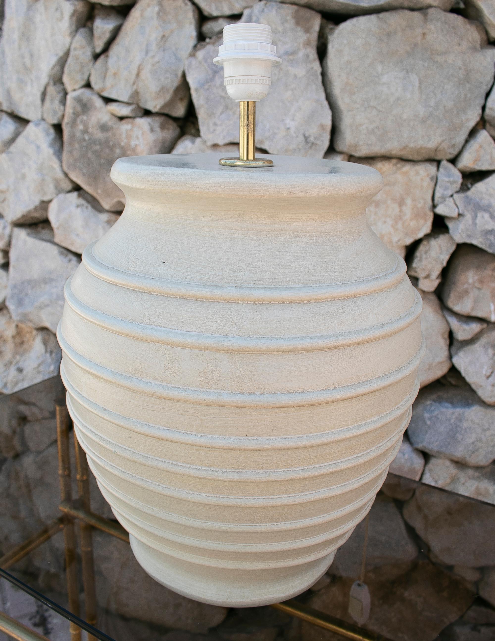 white terracotta lamp