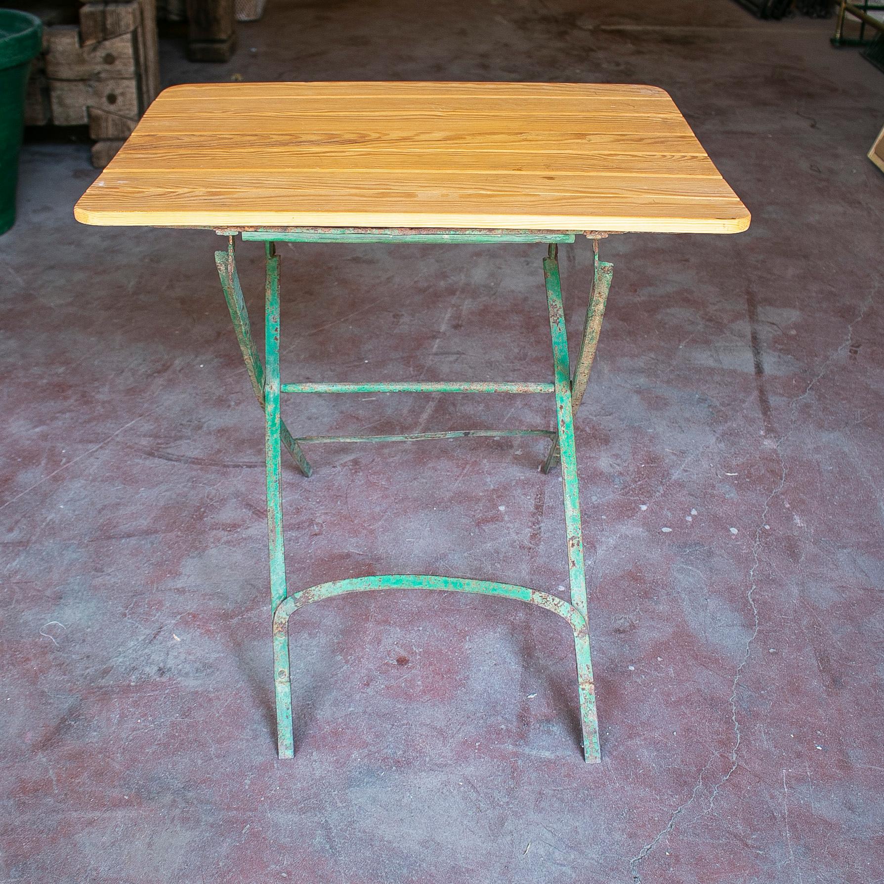 1970s Spanish Wooden Garden Table w/ Iron Base In Good Condition For Sale In Marbella, ES