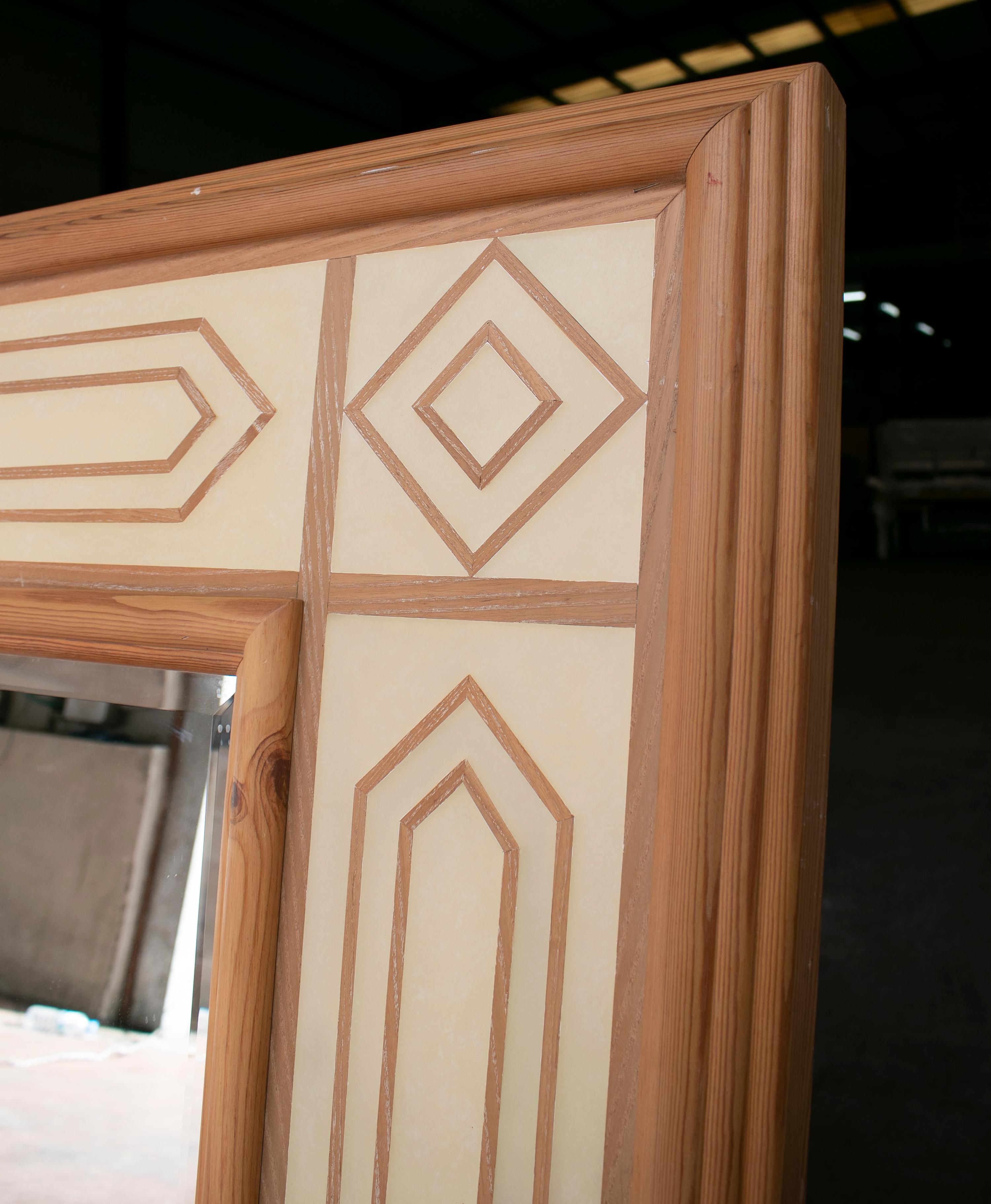 Vintage 1970s Spanish wooden mirror frame with geometric decoration.