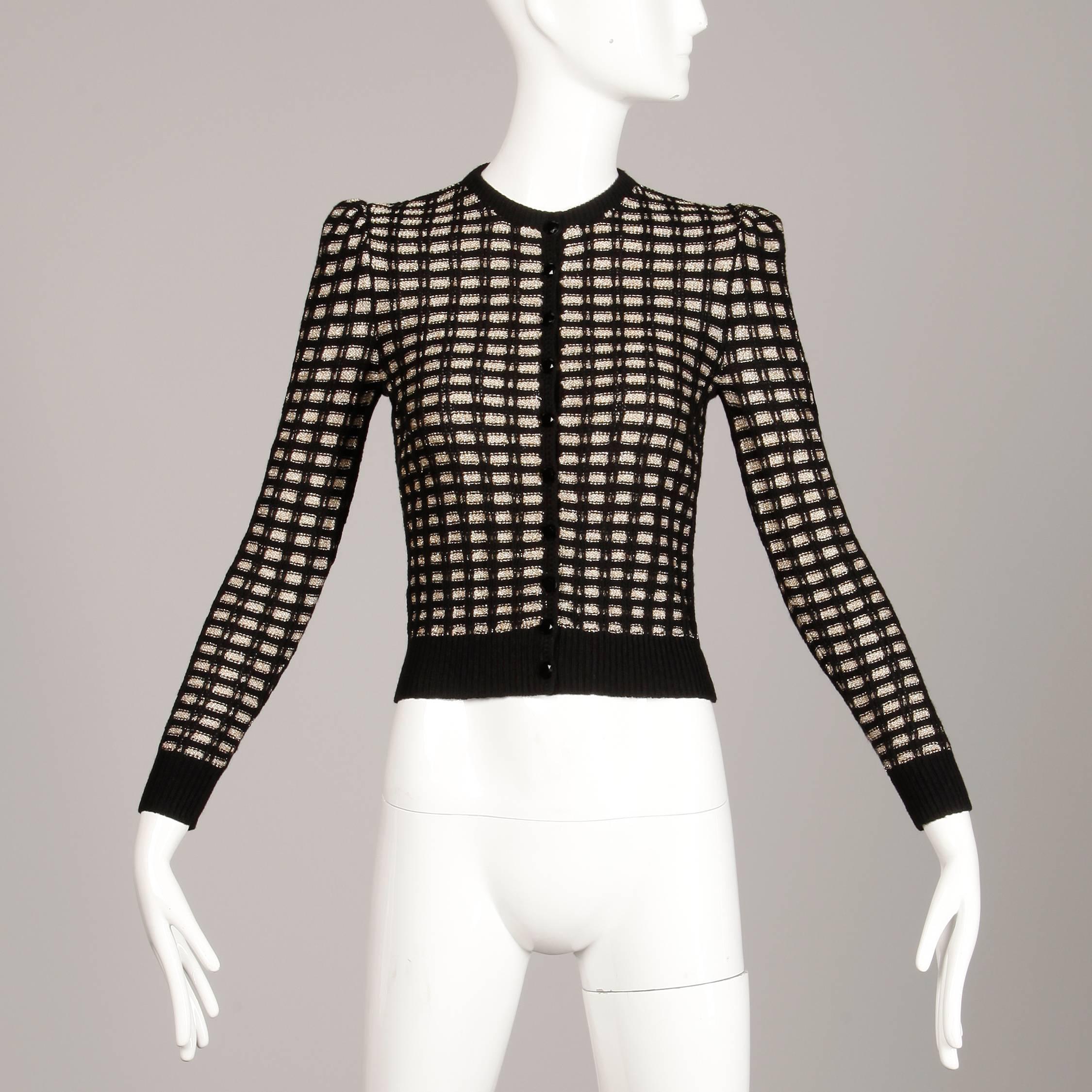 Darling vintage metallic gold and black tiny fit cardigan sweater by St. John for Lillie Rubin. Unlined with front button closure. Fits like a modern size XS-S. The bust measures 30-36