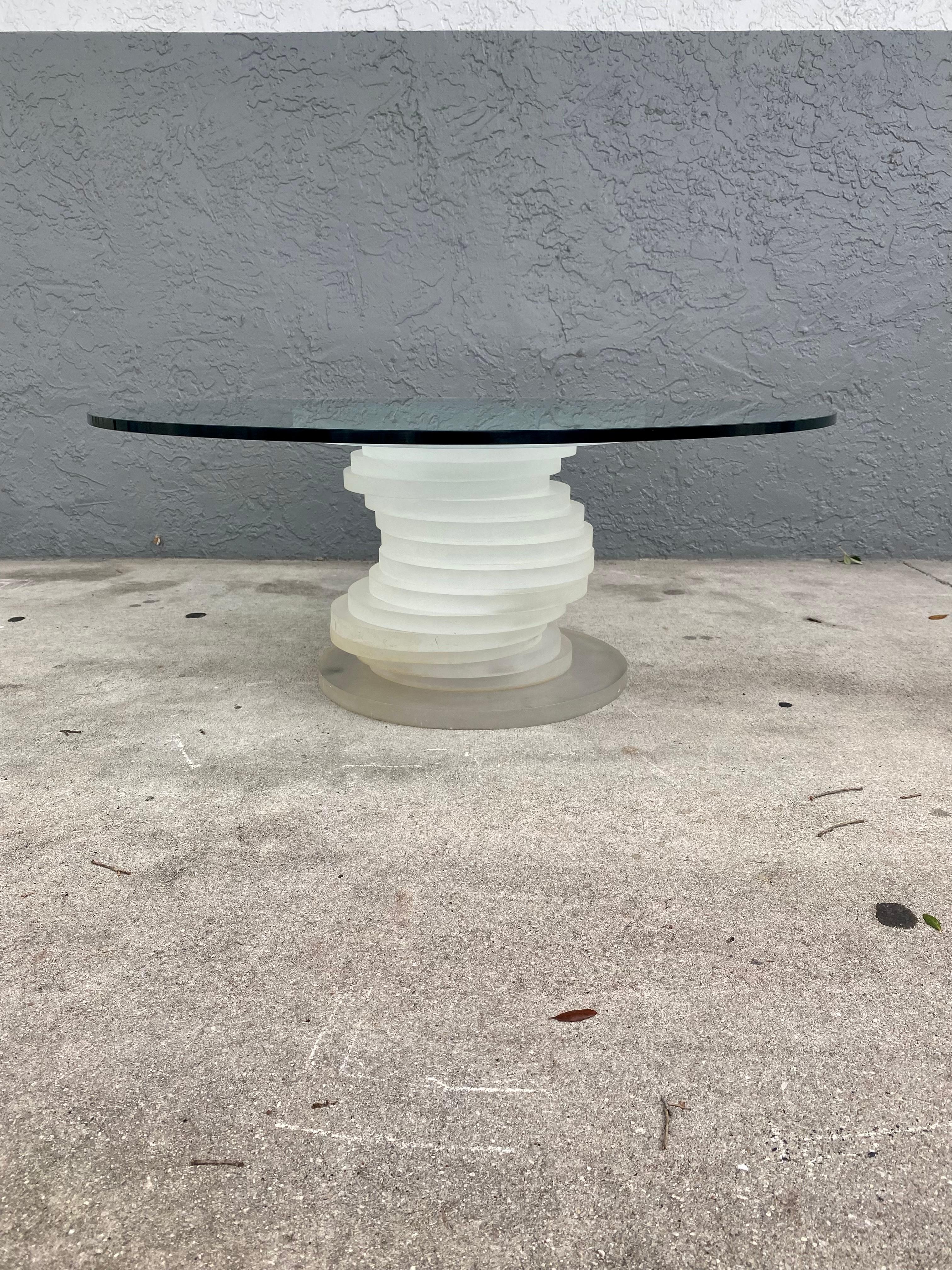 The beautiful rare frosted lucite coffee table is statement piece which is packed with personality! Just look at the gorgeous sculptural stacked circular lucite on this beauty! The table is individually produced and finished with the highest level