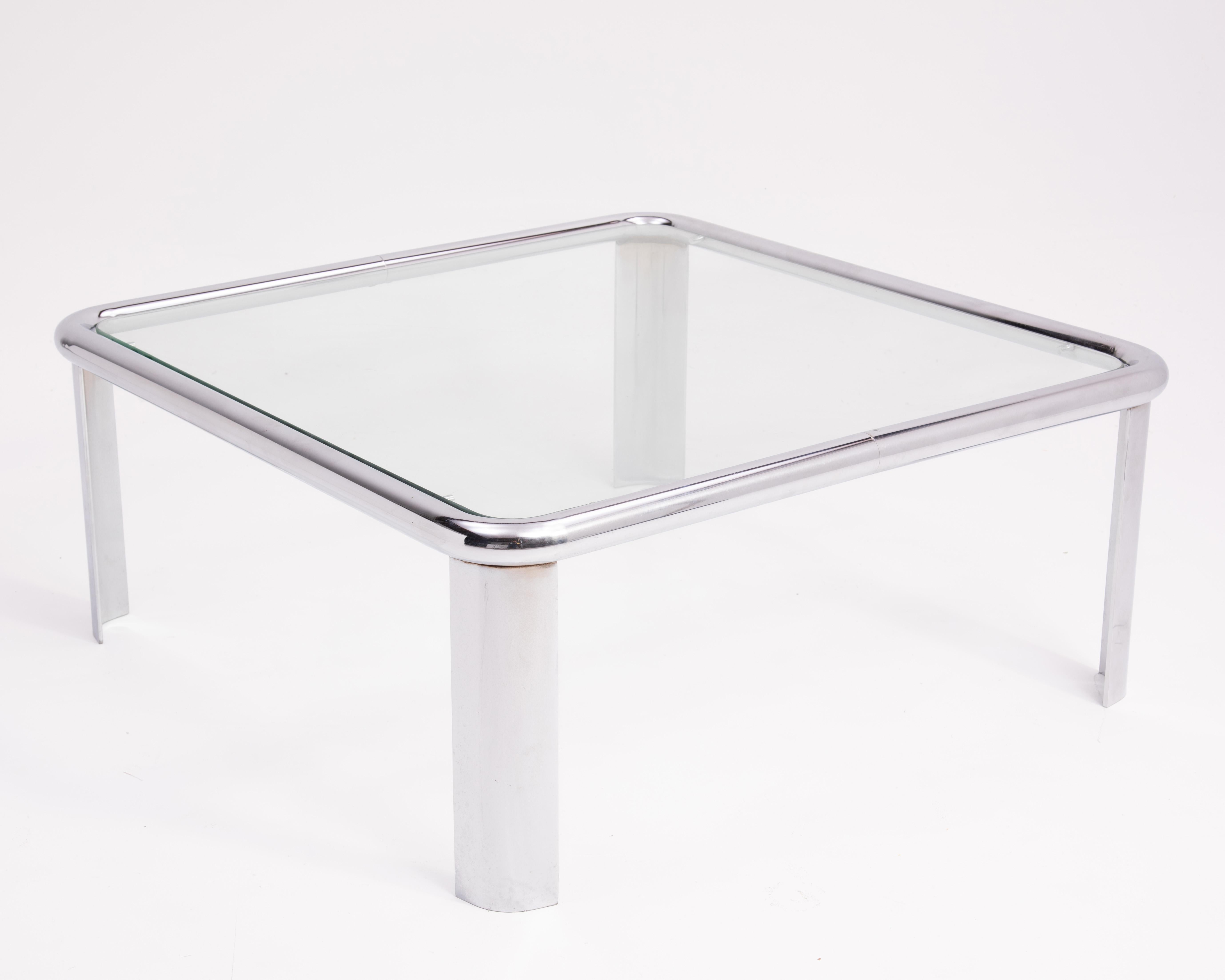 A 1970s tubular steel and glass coffee table in the style of the John Mascheroni 