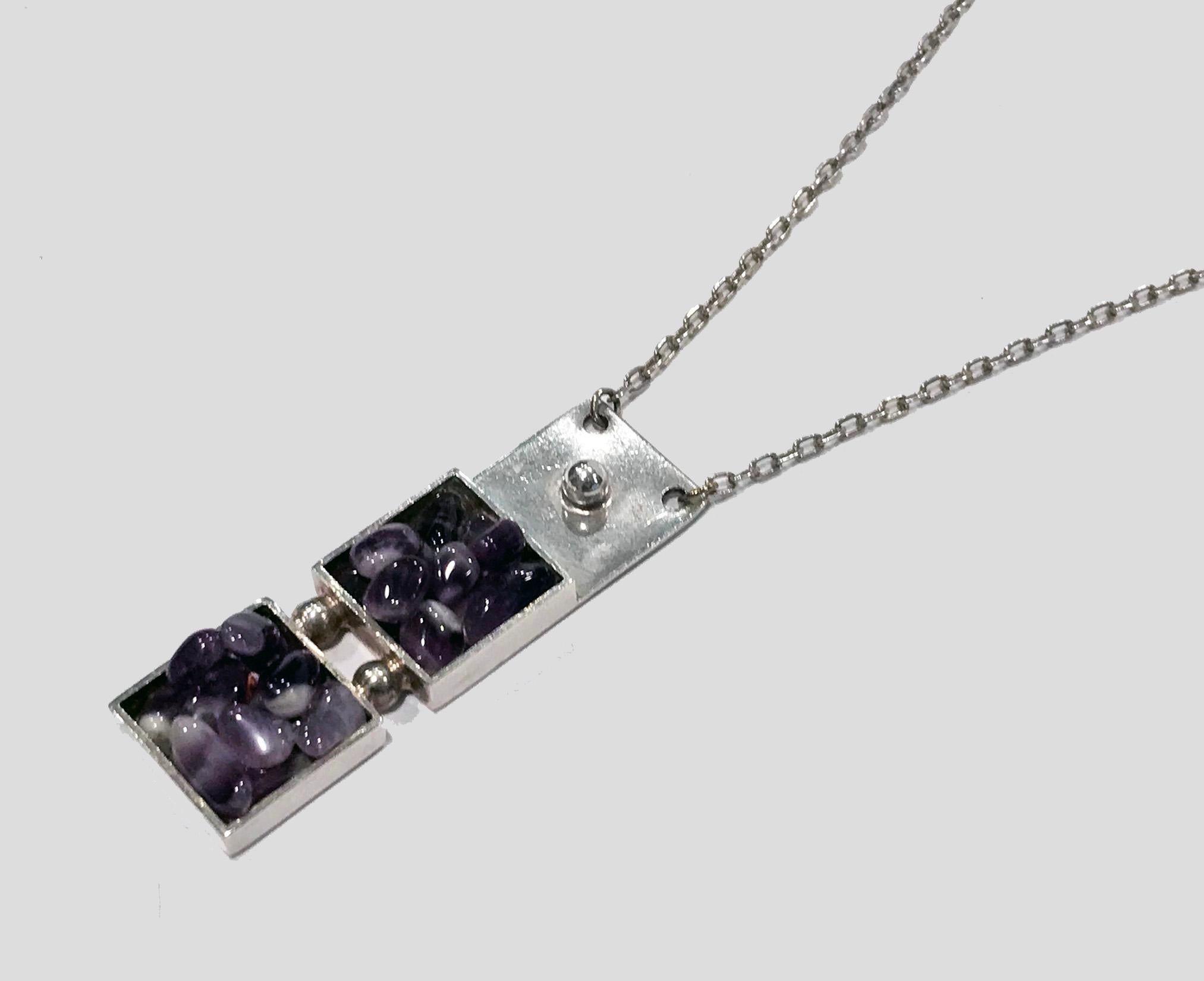 1970's Scandinavian Sterling Abstract Amethyst Quartz Crystal Necklace Pendant, Dansk Smykkekunst Denmark.The Necklace suspending a vertical square abstract design, two squares bezel set with numerous polished free form amethyst quartz. Sterling