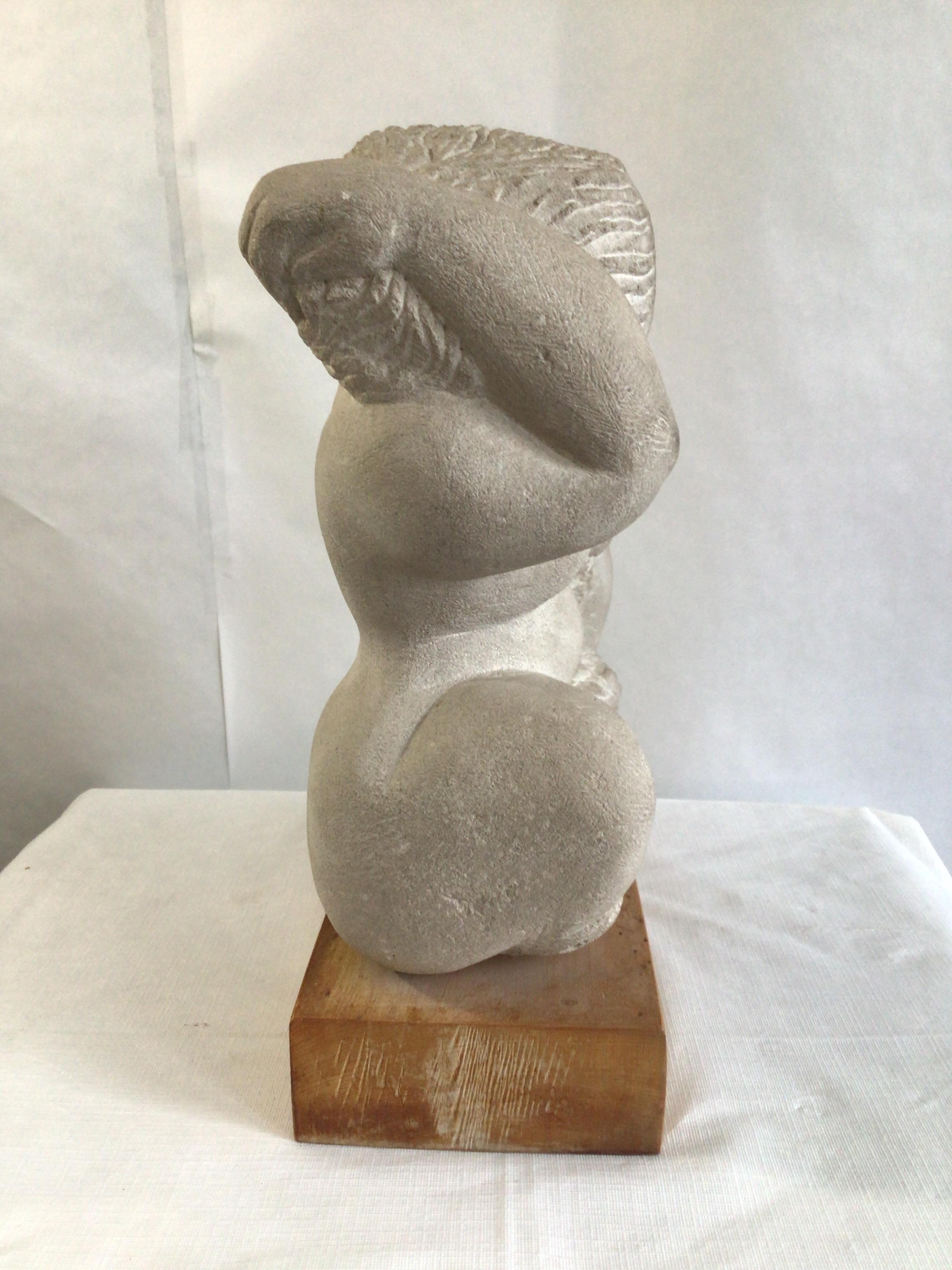 Unknown 1970s Stone Sculpture of a Voluptuous Woman on a Wood Base For Sale