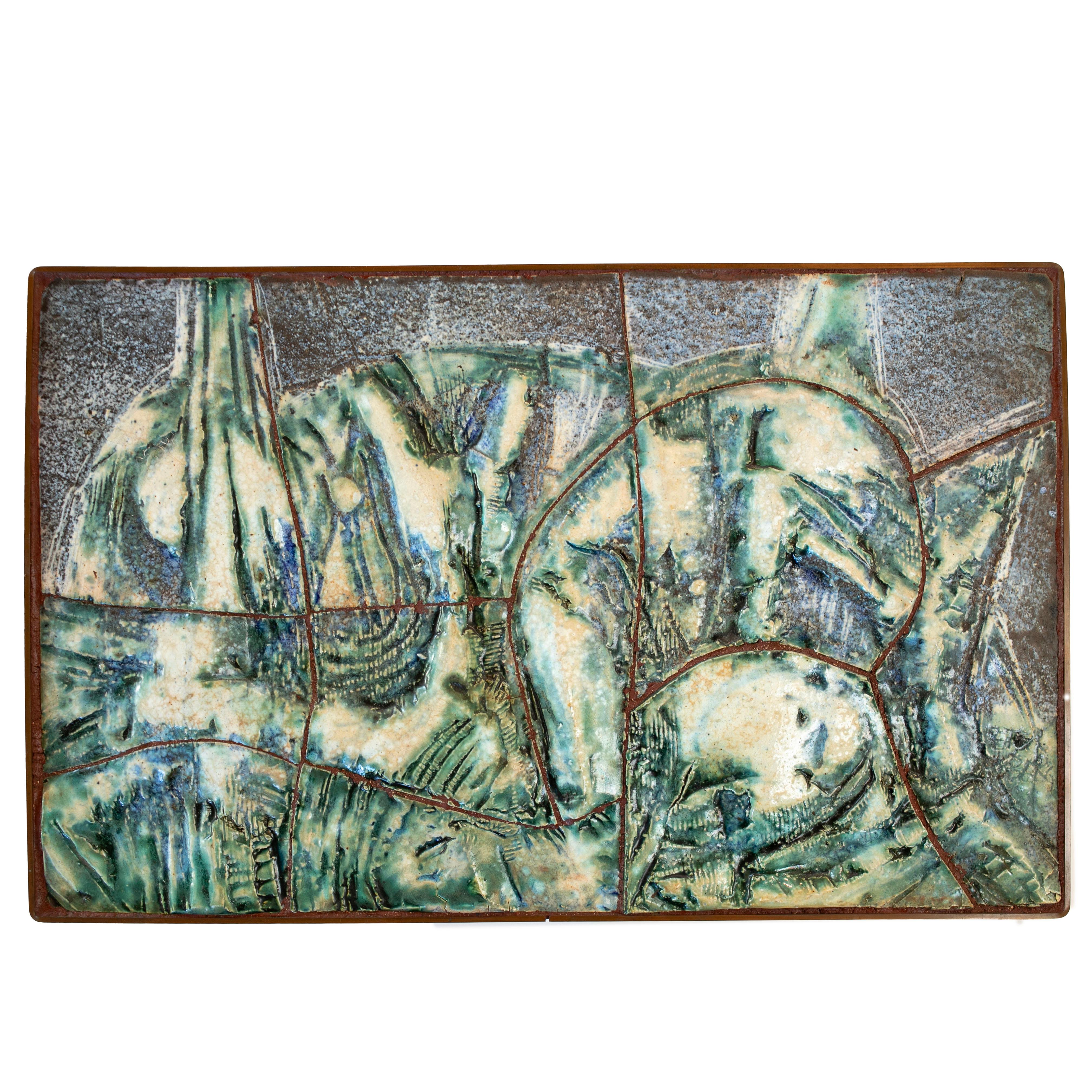 Peter Tybjerg, (Danish) b. 1944
One-of-a-kind stoneware wall relief decorated polychrome glaze. Signed and mounted in a iron frame.
Denmark approx. 1970-1980.

Renowned as a Danish Postwar & Contemporary artist, Peter Tybjerg is celebrated for his