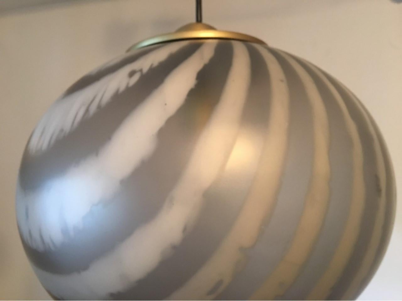 Metal 1970s Striped Glass Ball Pendant by Peill & Putzler For Sale