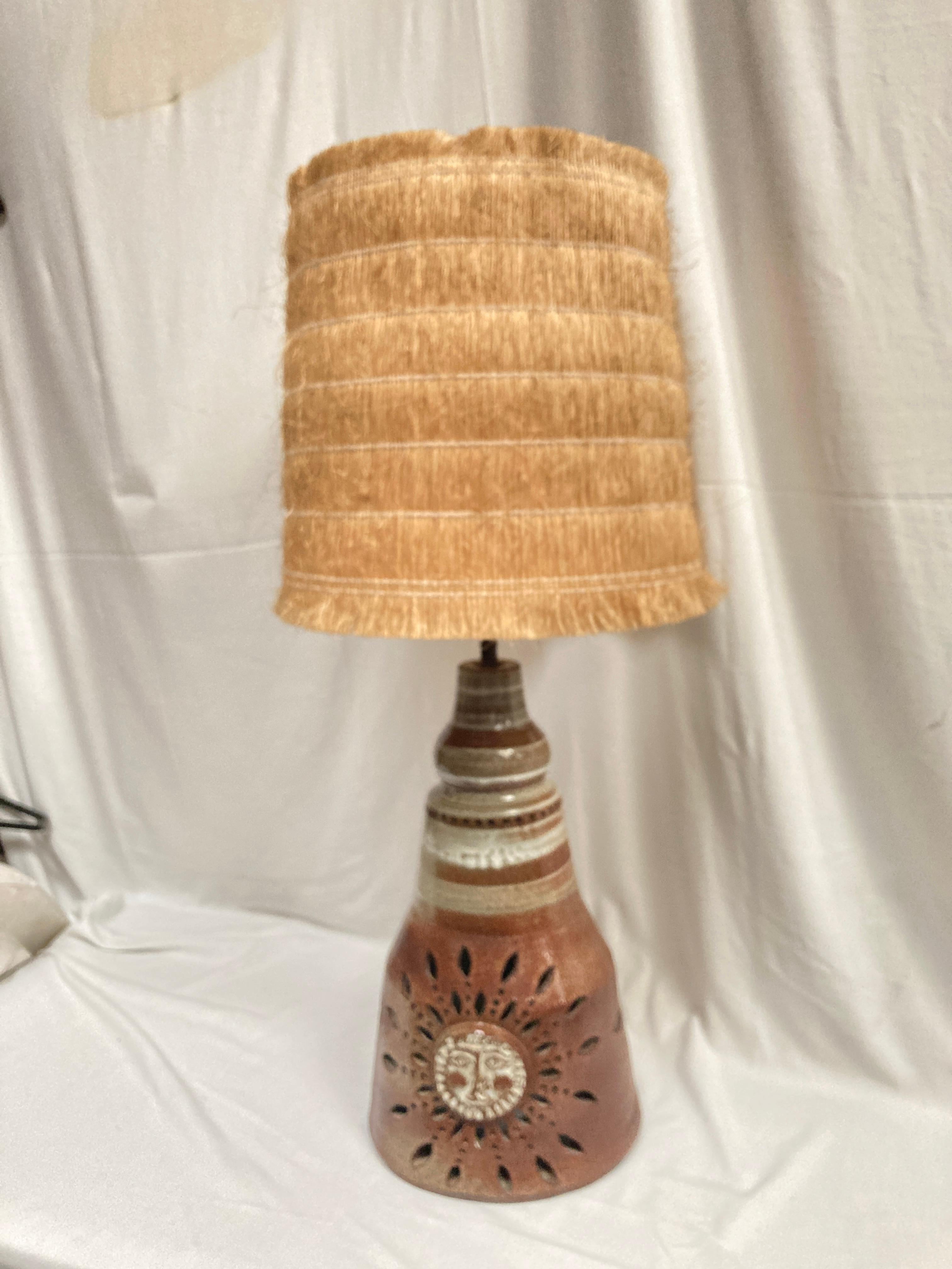 Very nice studio pottery ceramic lamp 
Two lights inside and outside
Sunburst decoration
No shade included
Dimensions given without shade