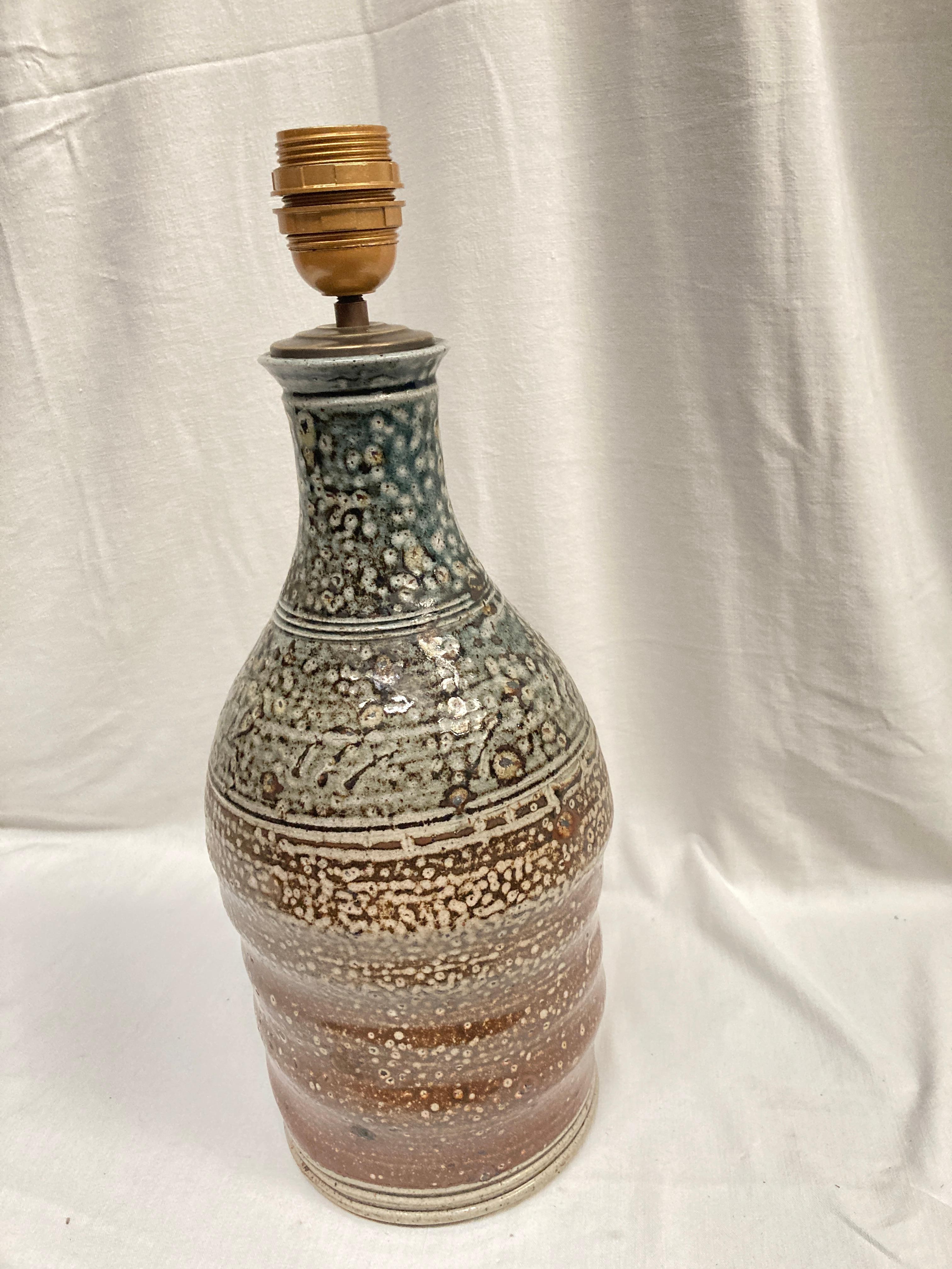1970's studio pottery lamp
Very interesting colors with brown and grey
Dimensions given without shade
No shade included