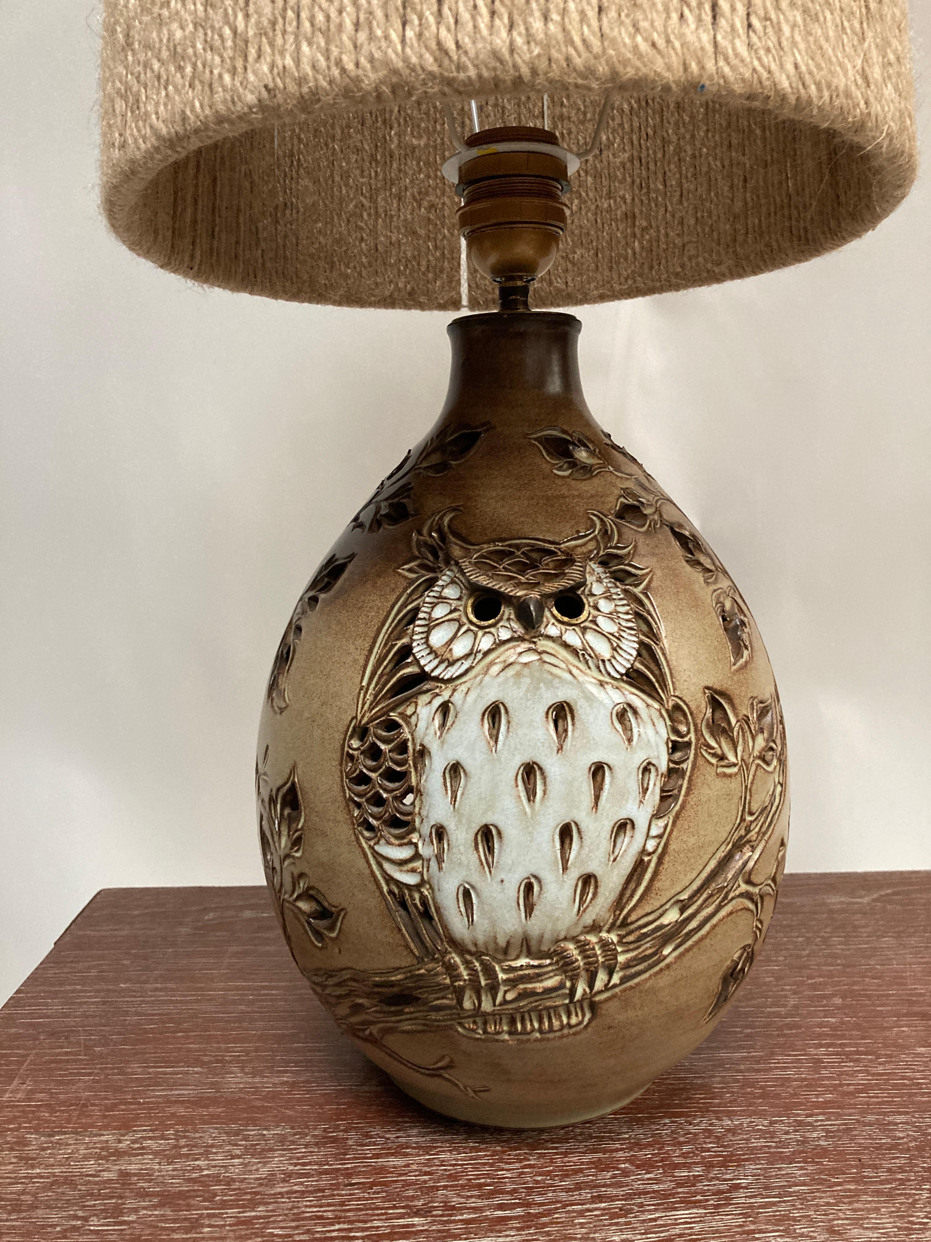 One of a kind hand made Studio pottery ceramic lamp
Showing a carved owl 
Two lights, one inside one outside
Dimensions given without shade
no shade included