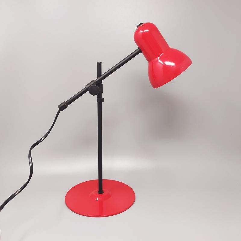 1970s Stunning red table lamp by Veneta Lumi. Made in Italy.
The lamp works perfectly and it's in excellent condition.
Dimension
diameter 6,29 x 13,77 height inches
diameter cm 16 x 35 height cm.
