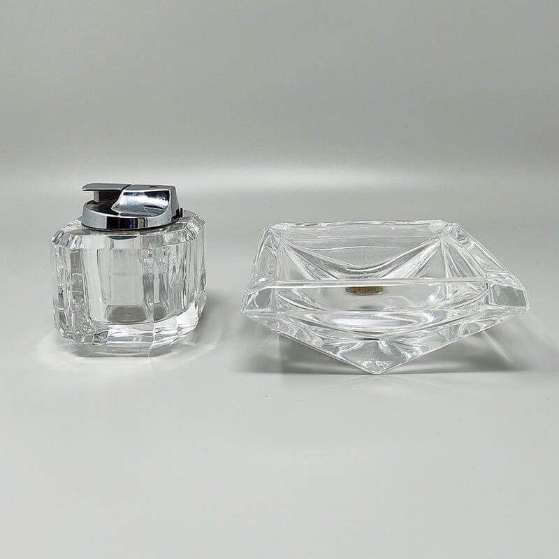 1970s Stunning smoking set in crystal by Cristal D'Arques. Made in France.
The items are in excellent condition. The table lighter works perfectly.
This smoking set is gorgeous
Dimensions:
Ashtray 4,72 x 4,72 x 1,96 H inches
Ashtray cm 12 x cm 12 x