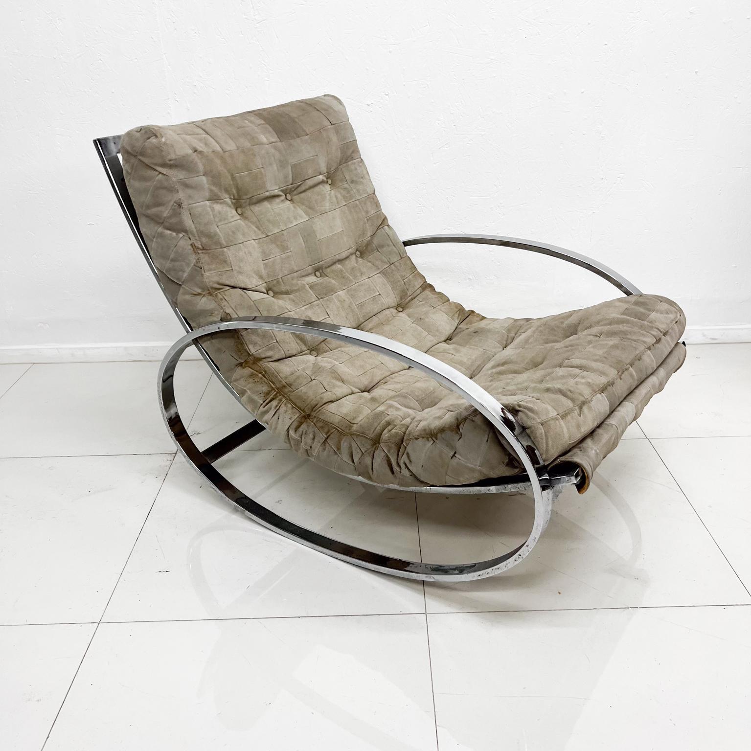 1970s Milo Baughman Style Chrome Hoop Ellipse Rocking Chair Renato Zevi
Modernist Rocker Tubular Steel for Selig Italy
Unmarked.
32 h x 42 d x 27.75 w Arm rest 19.63 Seat 15.75 h
Unrestored original preowned vintage condition.
Wear to the fabric as