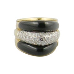 1970s Stylish 18 Karat Onyx and Diamond Ring