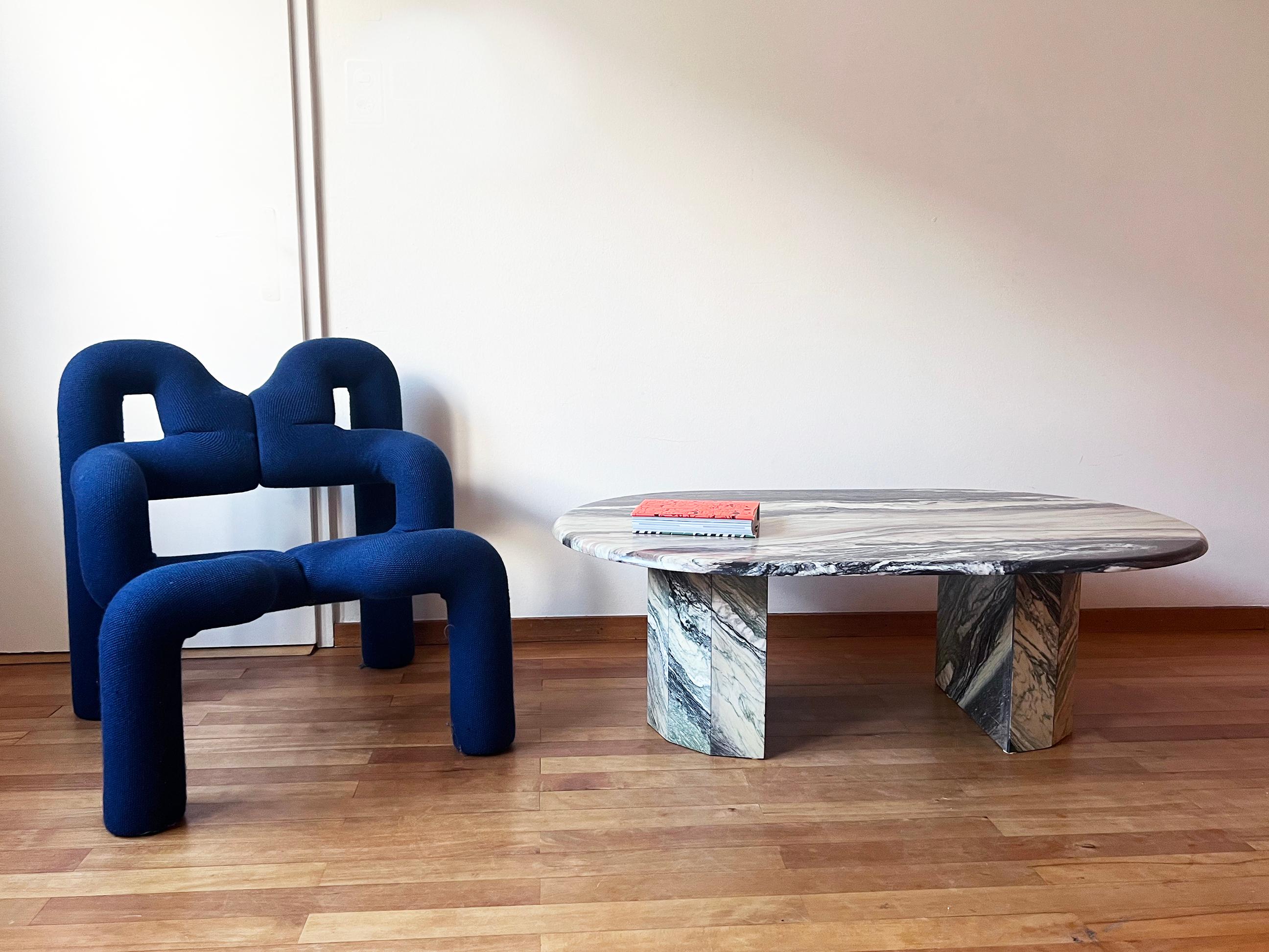Absolutely gorgeous marble coffee or cocktail table from the 1970s, in fantastic, virtually unused condition. 
Features incredibly stunning sculptural bases.
The top comes off from the bases for safer shipping.
The marble veining is absolutely