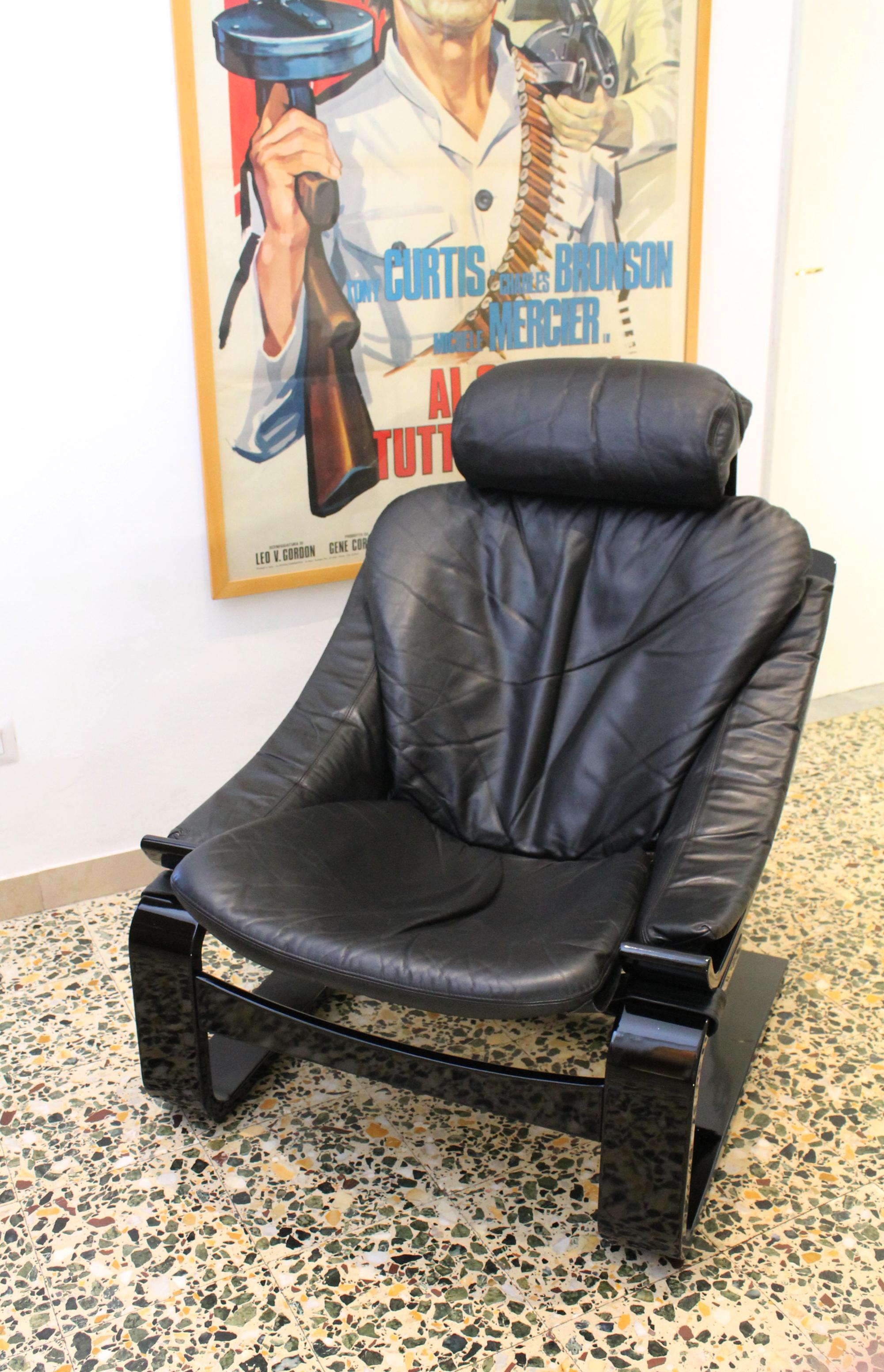1970s Swedish design by Ake Fribyter  Kroken lounge chair. Original upholstery in black leather  Removable headrest and seat with backrest, adjustable headrest. Manufactured by the Swedish brand Nelo in the 1970s.

Are you looking for an original