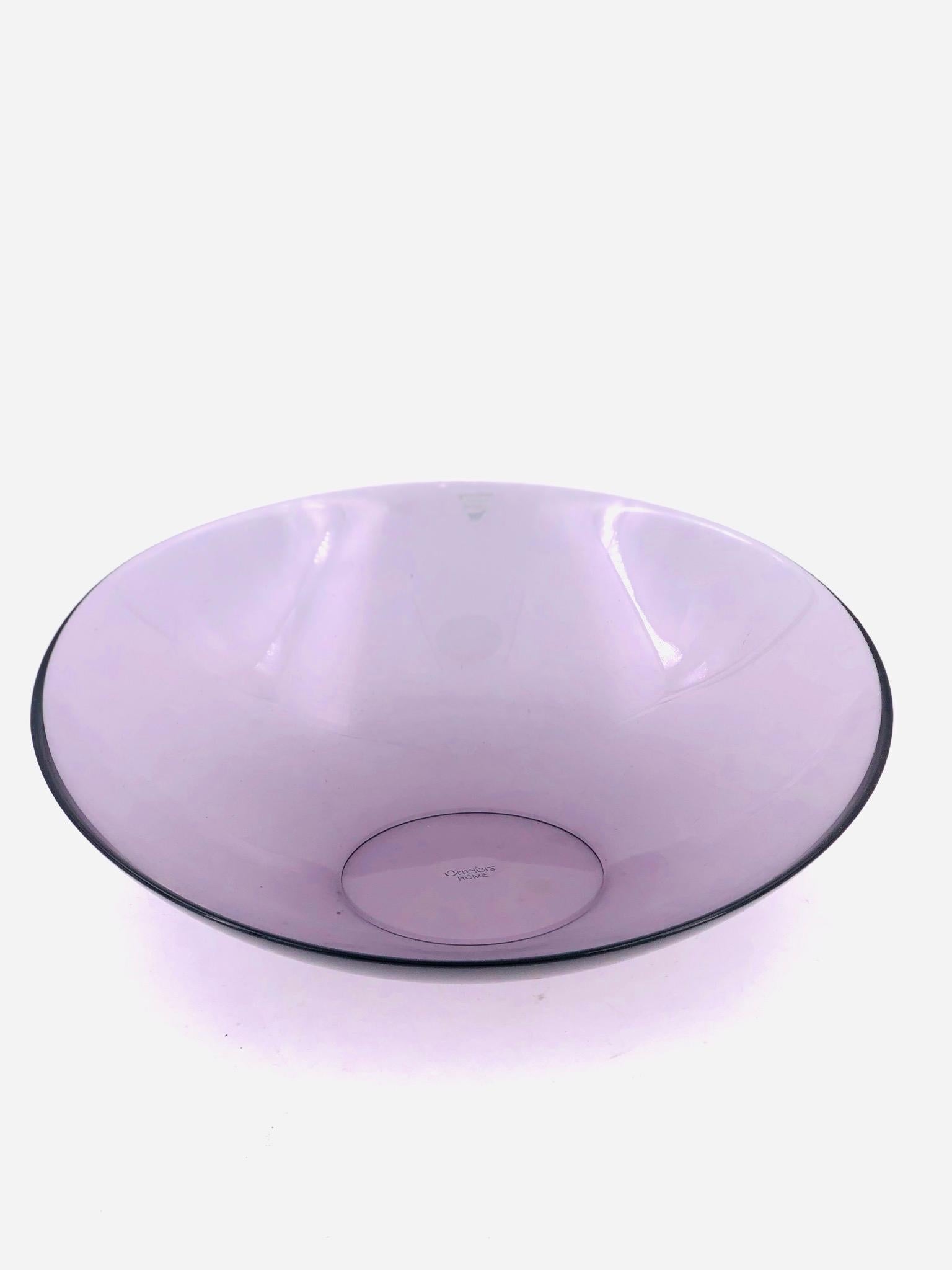 A beautiful shape bowl in purple by Orrefors of Sweden, circa 1970s. Beautiful condition no chips, cracks or scratches stamped at the bottom retains its label.