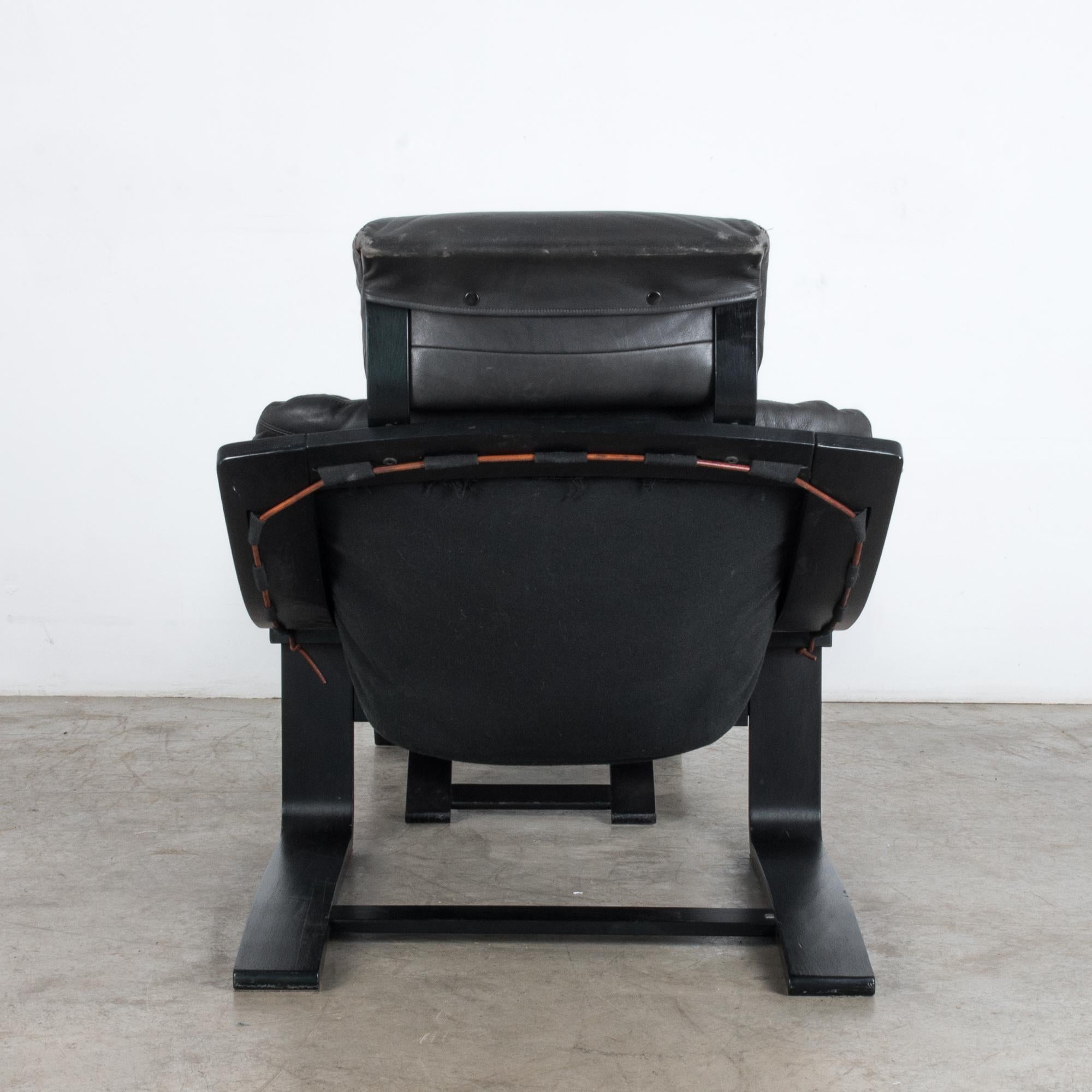 1970s Swedish Kroken Black Leather Armchair and Ottoman by Ake Fribytter 1